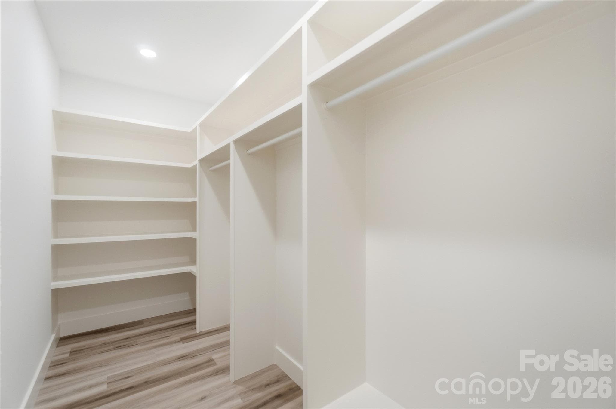 Primary closet - pocket door - 10120 Mini Ranch Road, Waxhaw