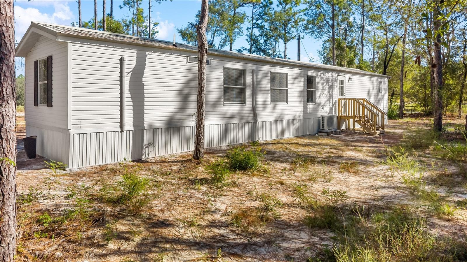 Manufactured Home at 1655 NW 65TH ST, BELL, photo 6 of 36