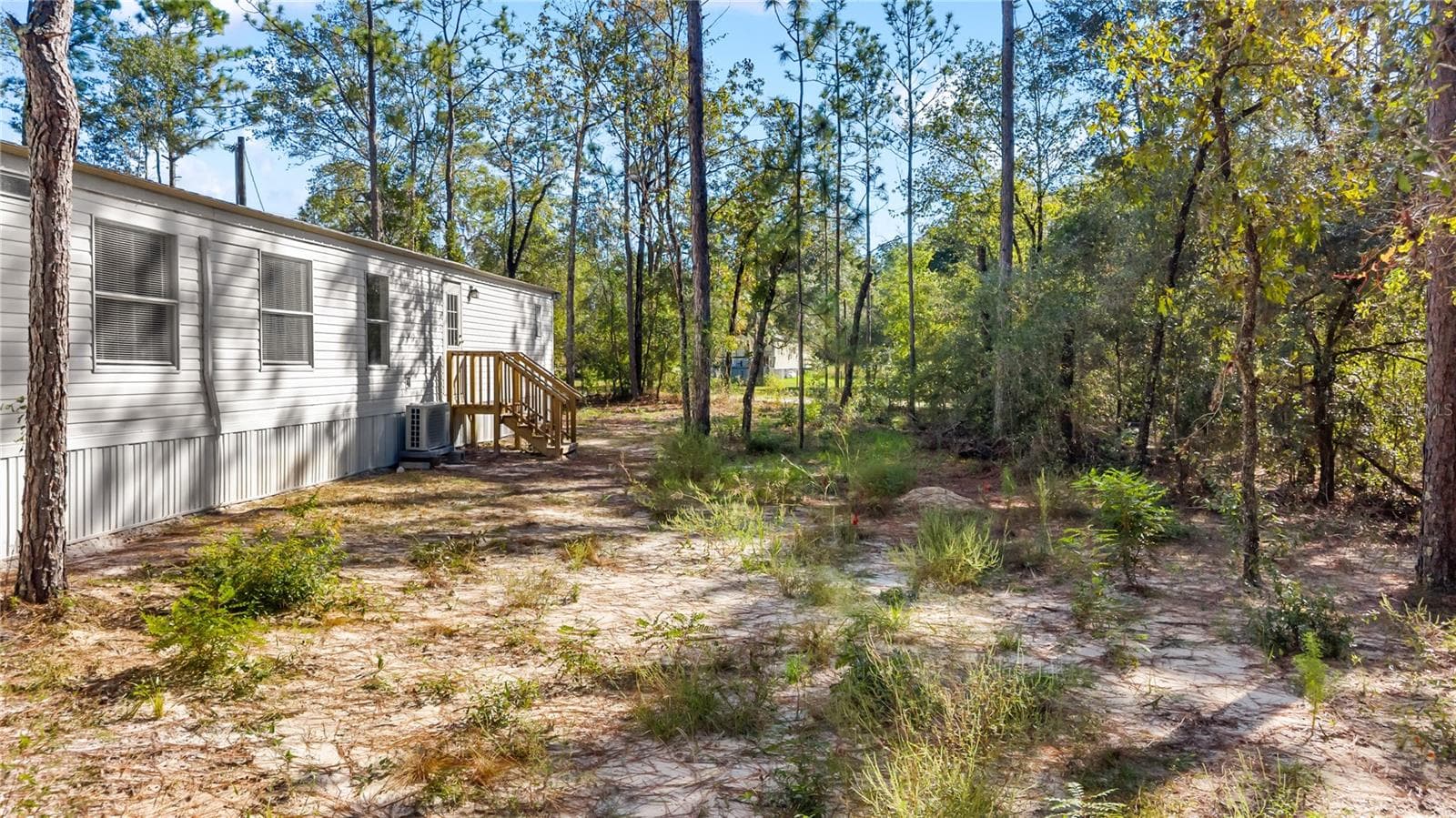 Manufactured Home at 1655 NW 65TH ST, BELL, photo 7 of 36