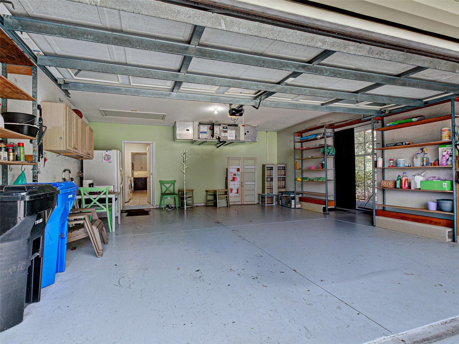 The large two-car garage has room for cabinets, a refrigerator and shelving - 251 VISTA DEL LAGO WAY, VENICE