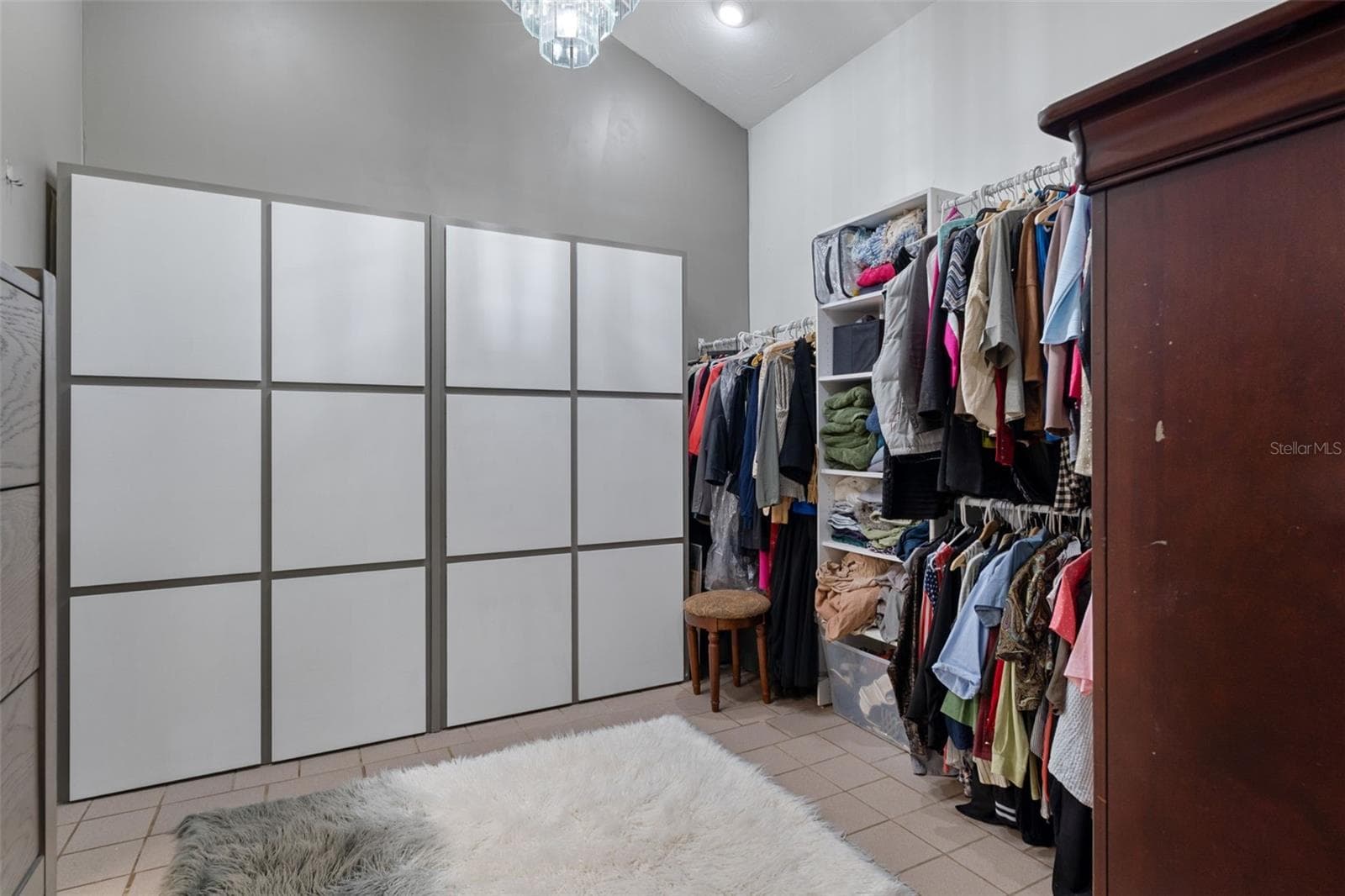 Primary bedroom walk-in closet - 9498 NW 60TH AVE, OCALA