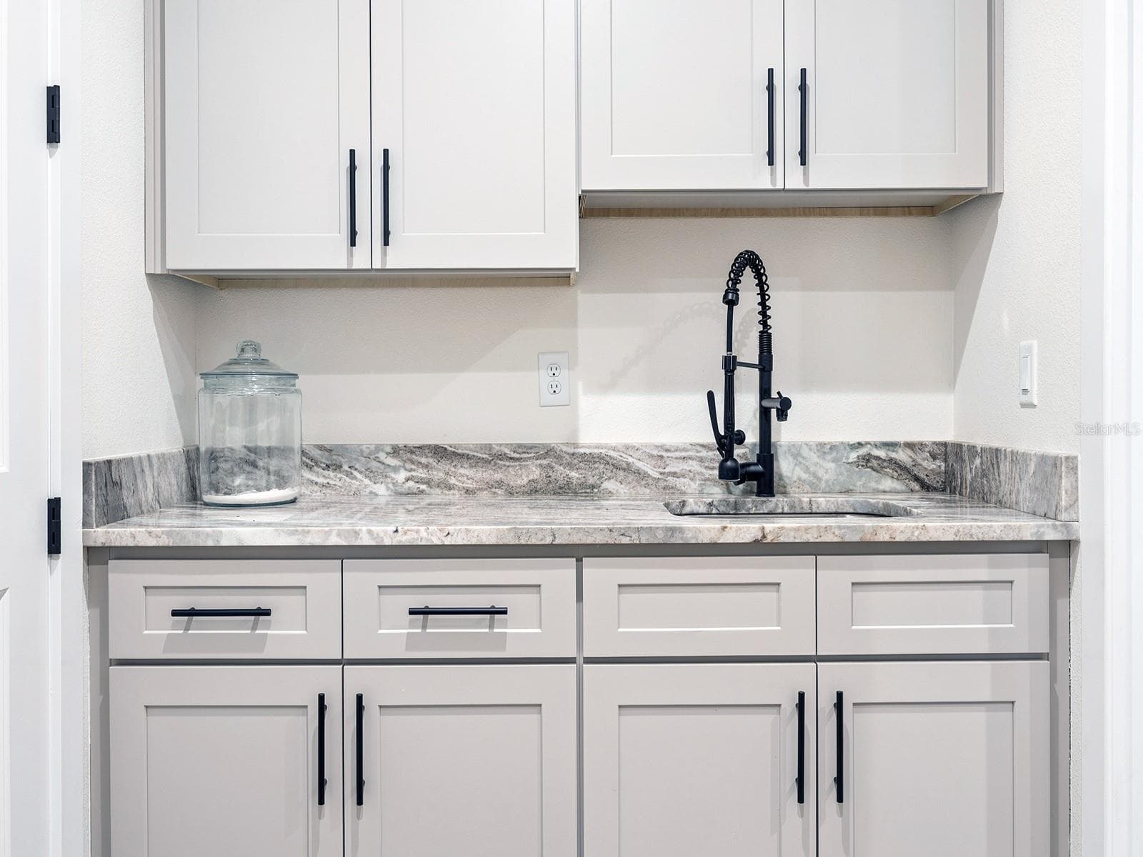Laundry room sink and cabinets - 412 SNOW HILL RD, GENEVA