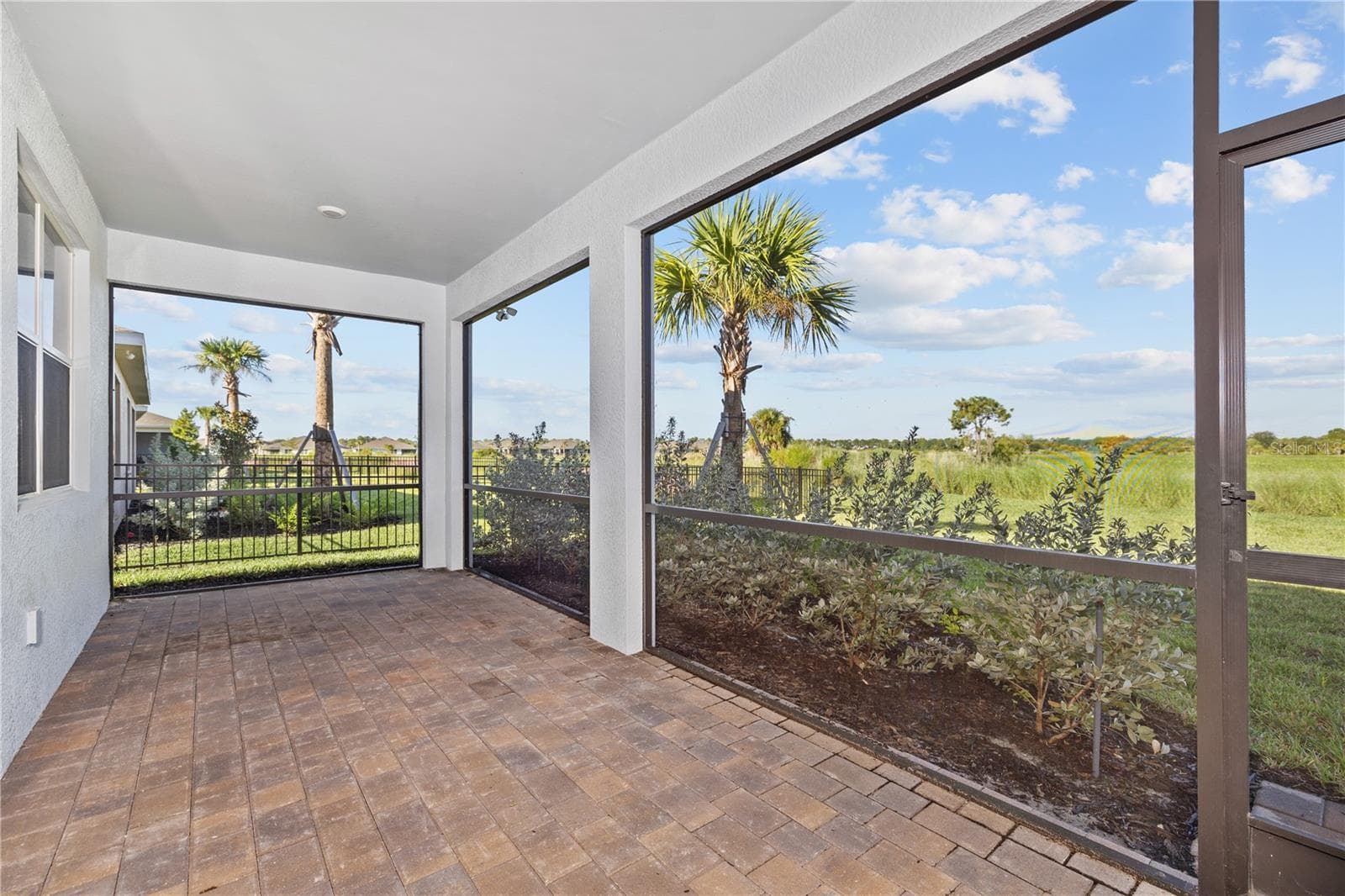 Covered back porch - 17740 SHADE TREE LOOP, PUNTA GORDA