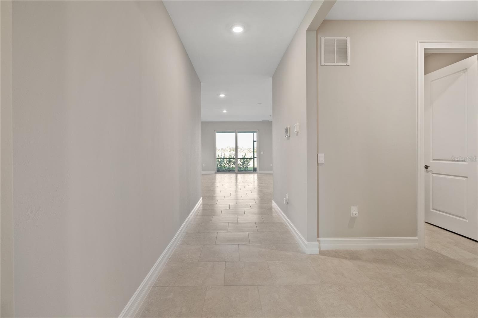 Foyer leading into home. - 17740 SHADE TREE LOOP, PUNTA GORDA