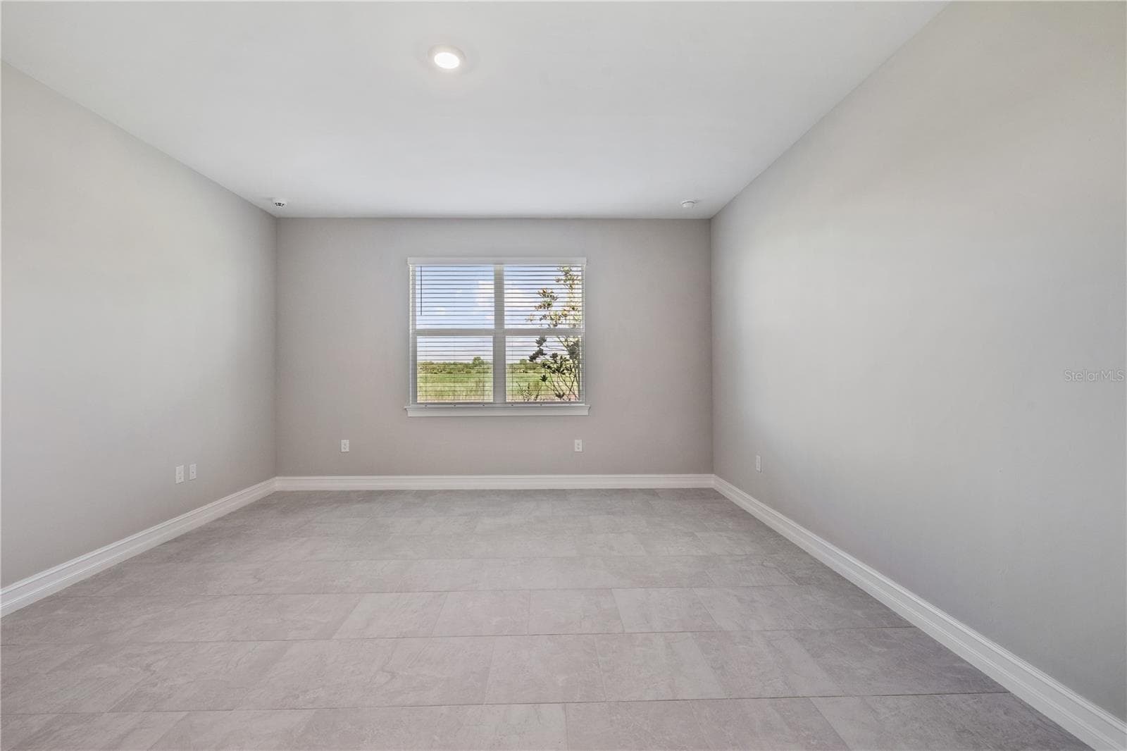 View of conservation area from primary bedroom - 17740 SHADE TREE LOOP, PUNTA GORDA