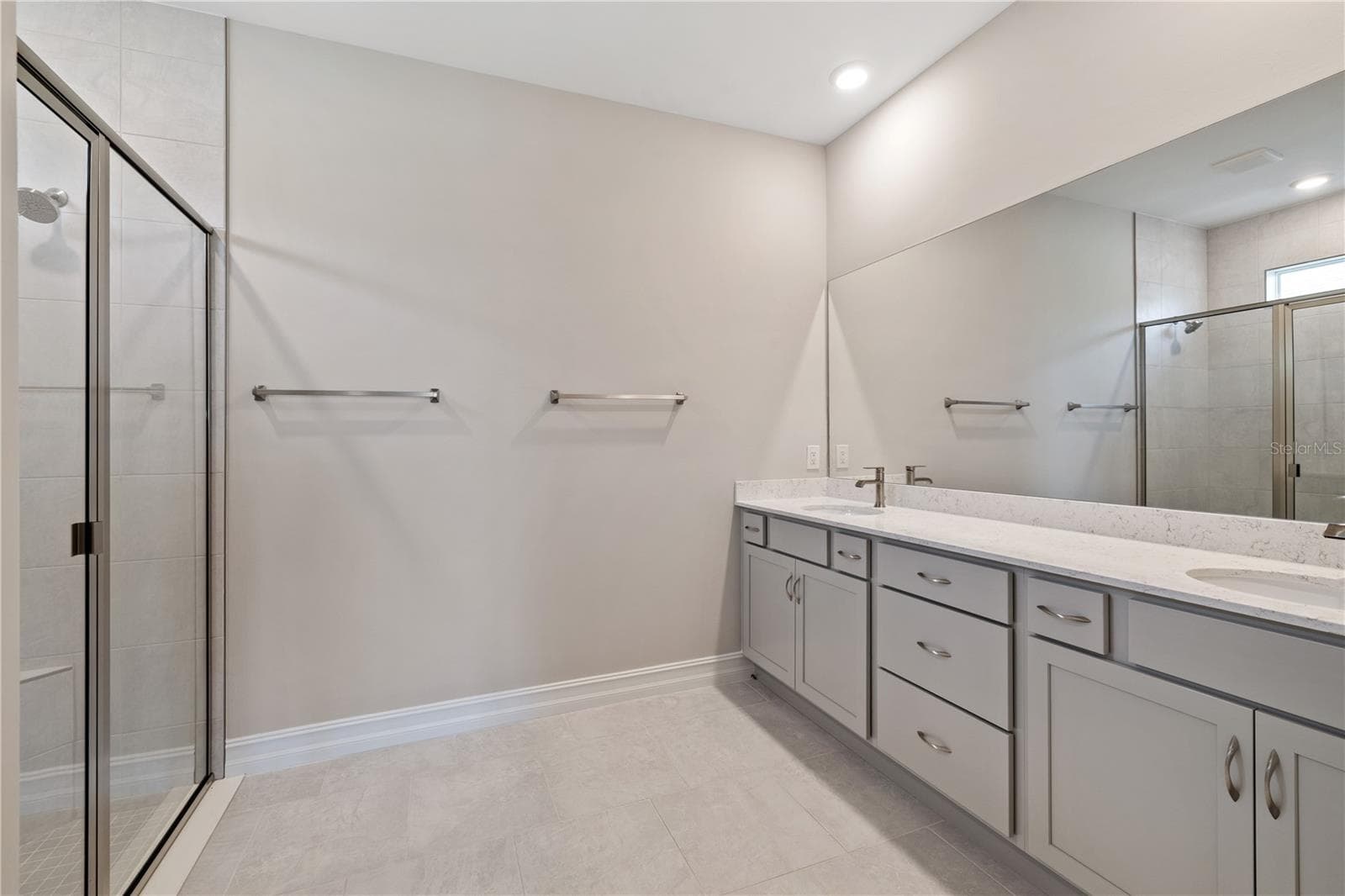 Primary bathroom with two sinks. - 17740 SHADE TREE LOOP, PUNTA GORDA