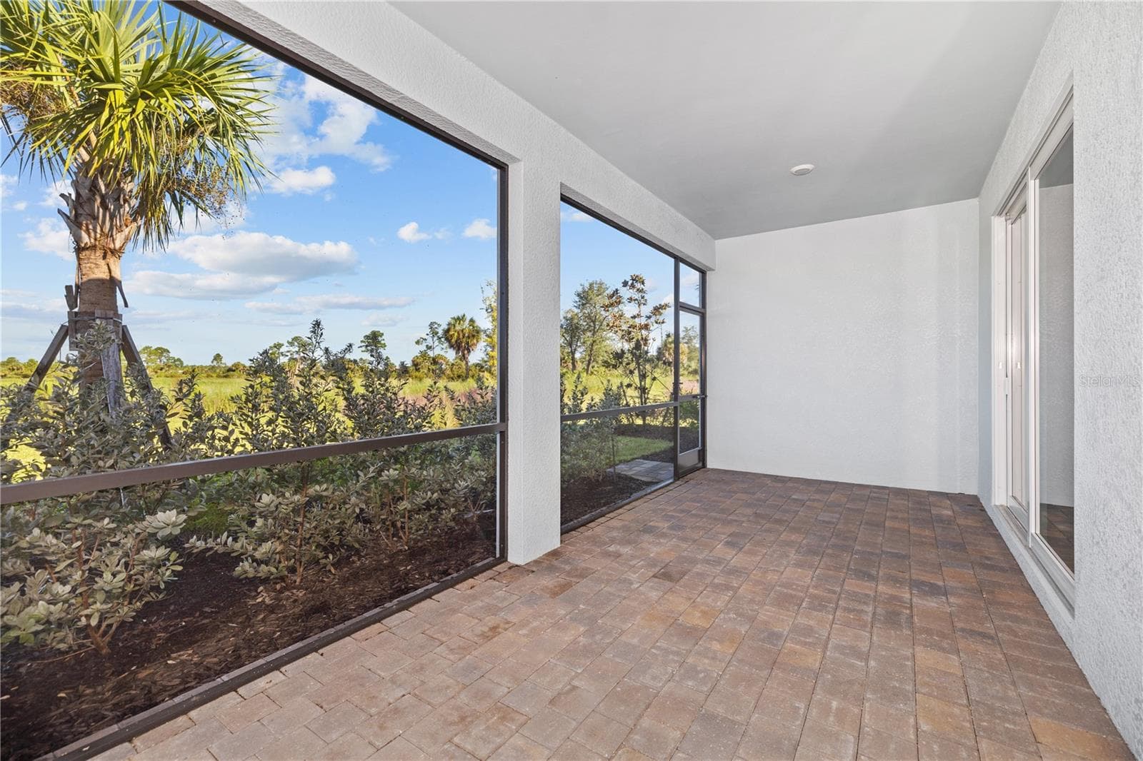 Covered back porch with no backyard neighbors - 17740 SHADE TREE LOOP, PUNTA GORDA