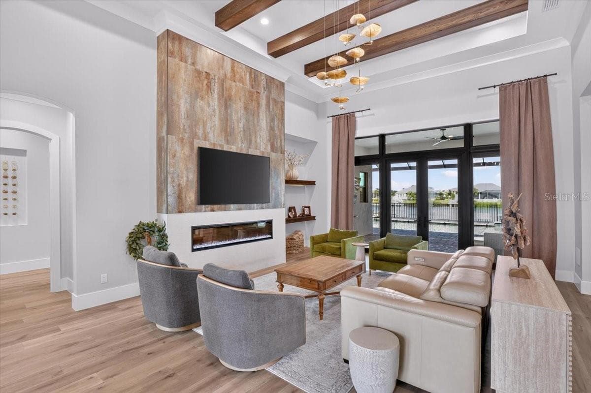 Electric Fireplace with Porcelain Tile and Custom Wood Mantel - 1625 RIO VISTA TER, PARRISH