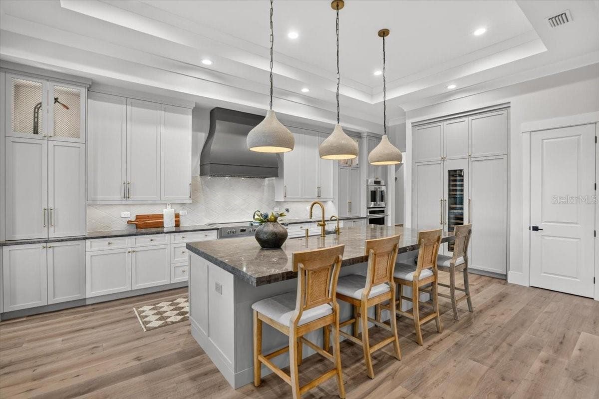 Custom Tile Backsplash, Walk-in Pantry with electric outlets. - 1625 RIO VISTA TER, PARRISH