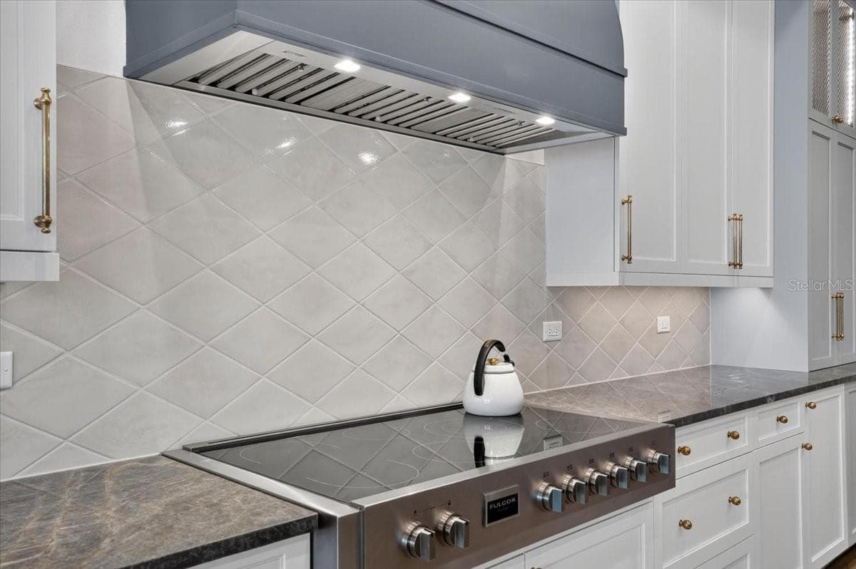 7-burner, 48" Fulgor Milano induction range and custom wood hood - 1625 RIO VISTA TER, PARRISH