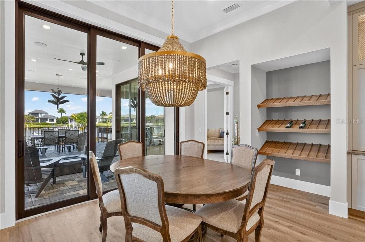 White Oak, custom built Wien shelves.  Designer lighting. - 1625 RIO VISTA TER, PARRISH
