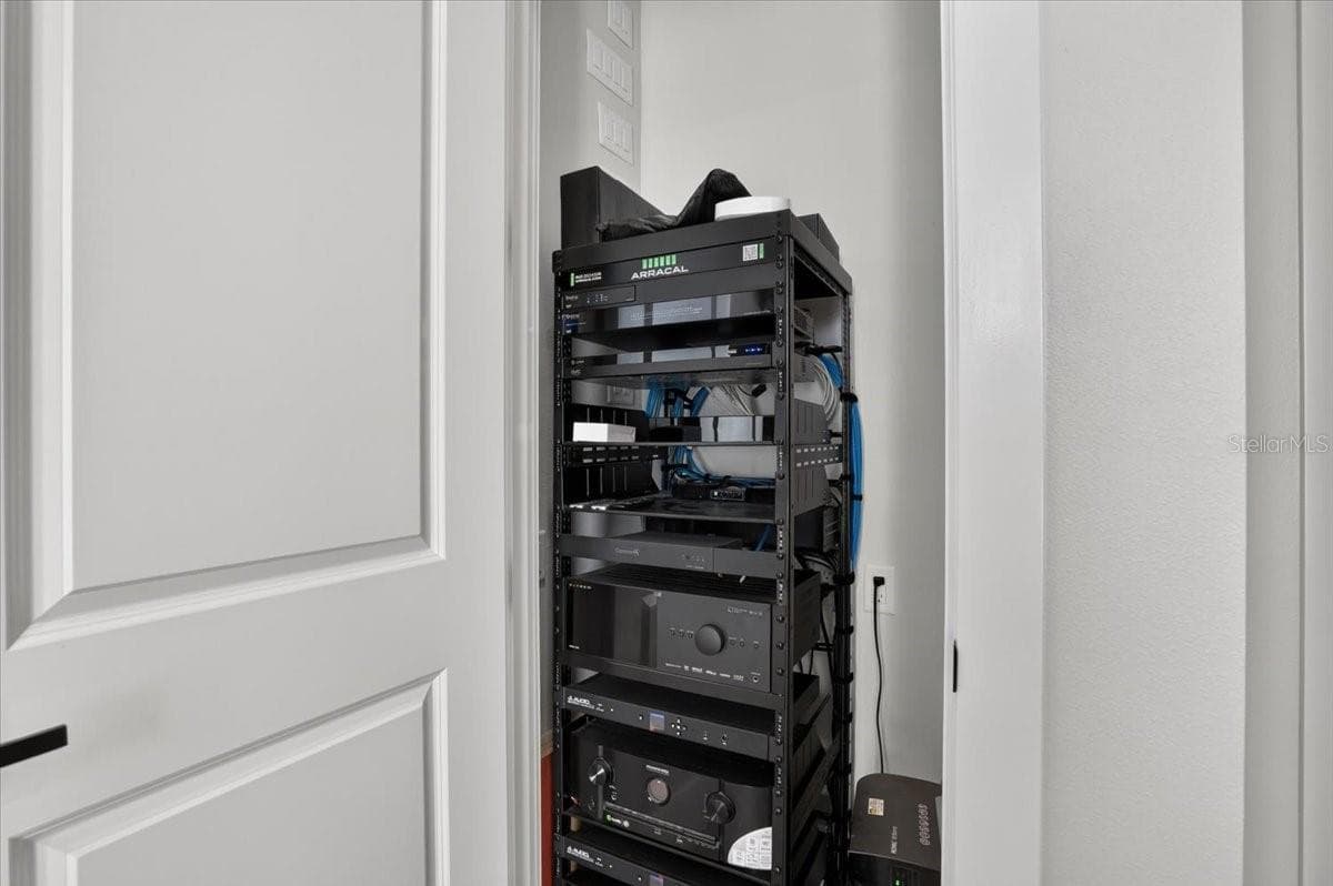 Full home Control4 automation: all lighting, fans, distribute audio, theater system, living rm TV, cameras, garages and exterior lighting.  Devices can be turned on at certain time, or different light for different moods. - 1625 RIO VISTA TER, PARRISH