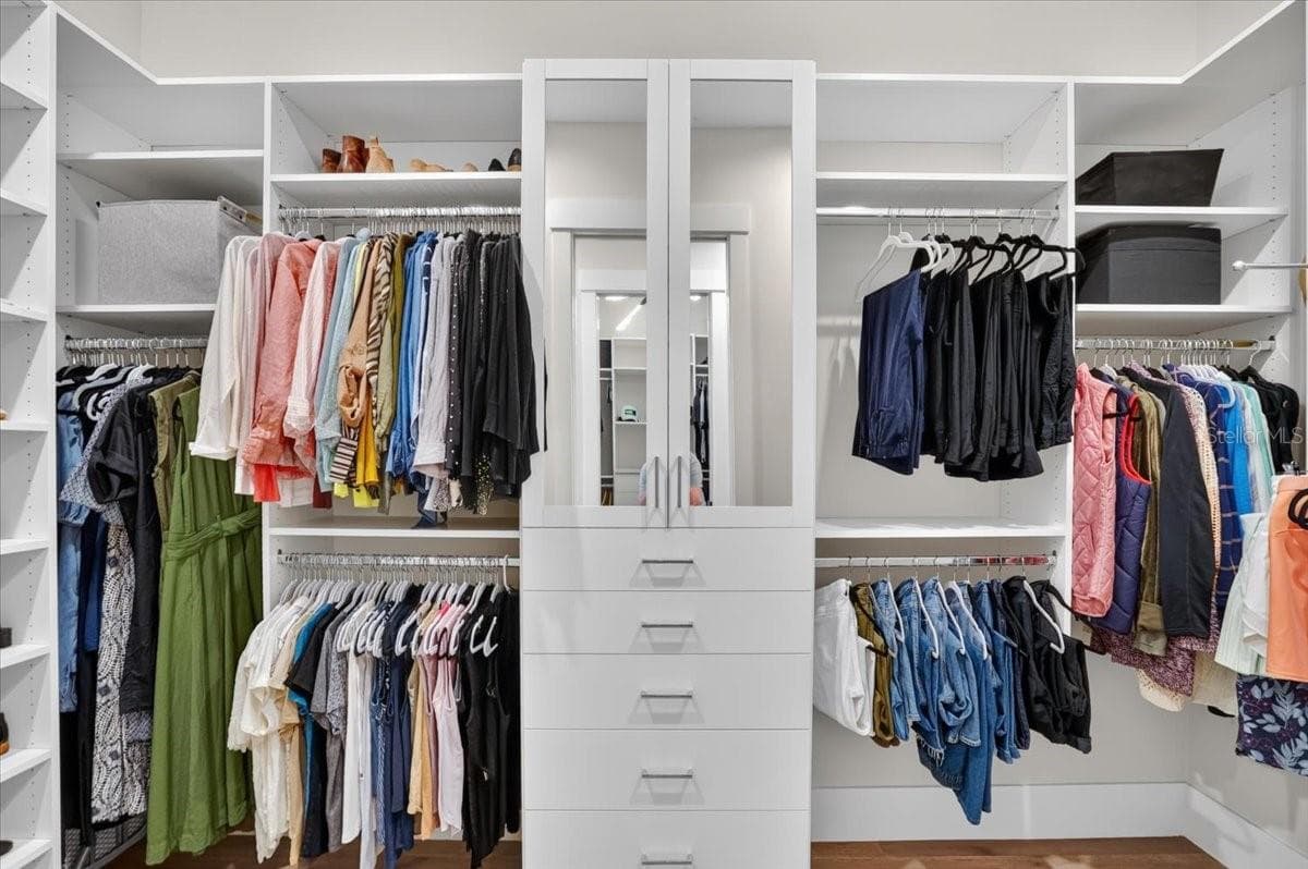 Dual Walk In Closets with Custom Cabinetry and Shelving. - 1625 RIO VISTA TER, PARRISH