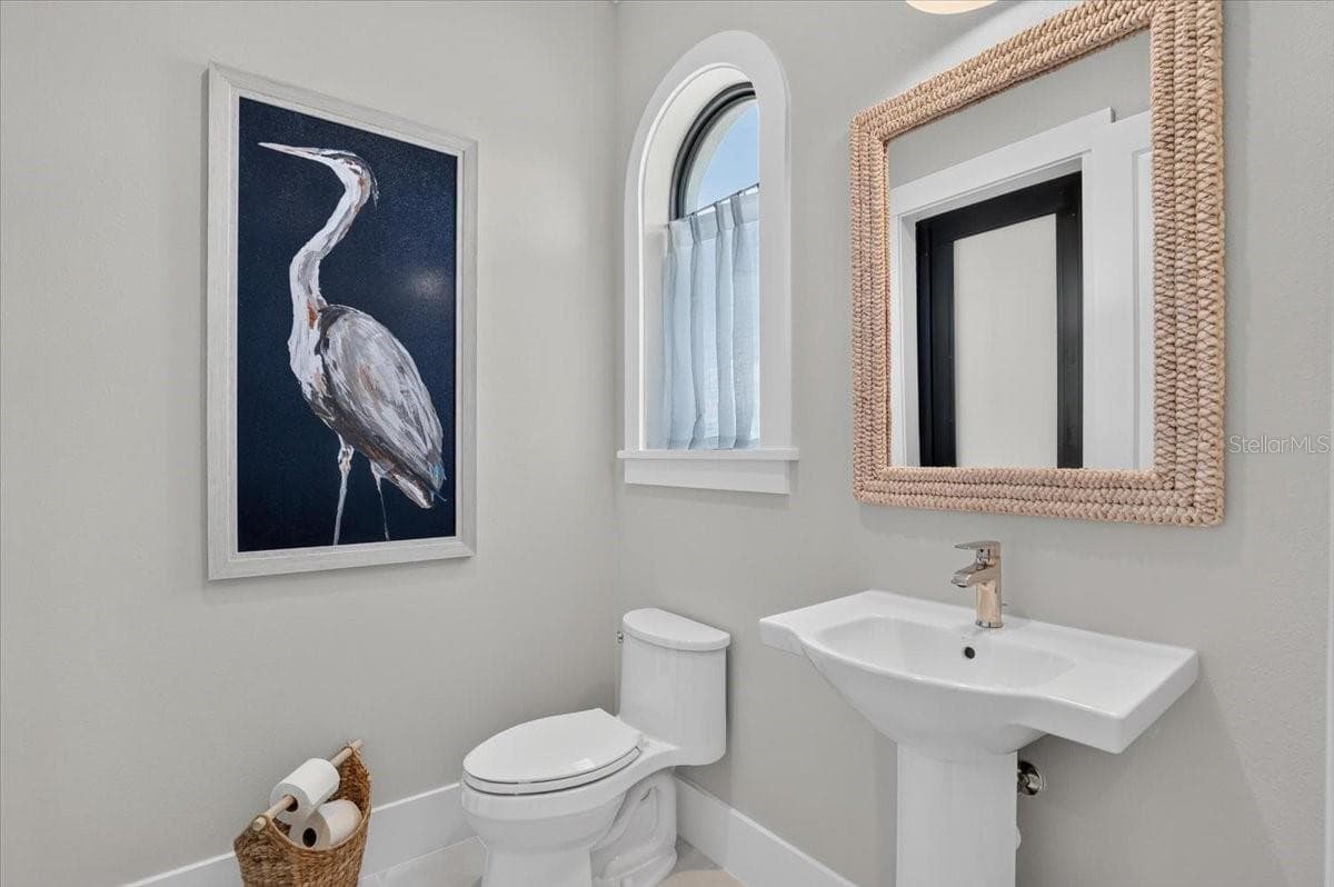 Guest/Pool Bath: Backlit mirror, Floating Vanity and Linen Closet - 1625 RIO VISTA TER, PARRISH