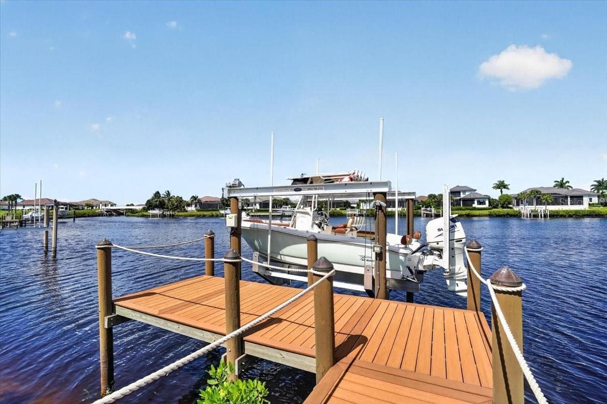 Trex boat dock with 20,000lb lift, water and electric. - 1625 RIO VISTA TER, PARRISH