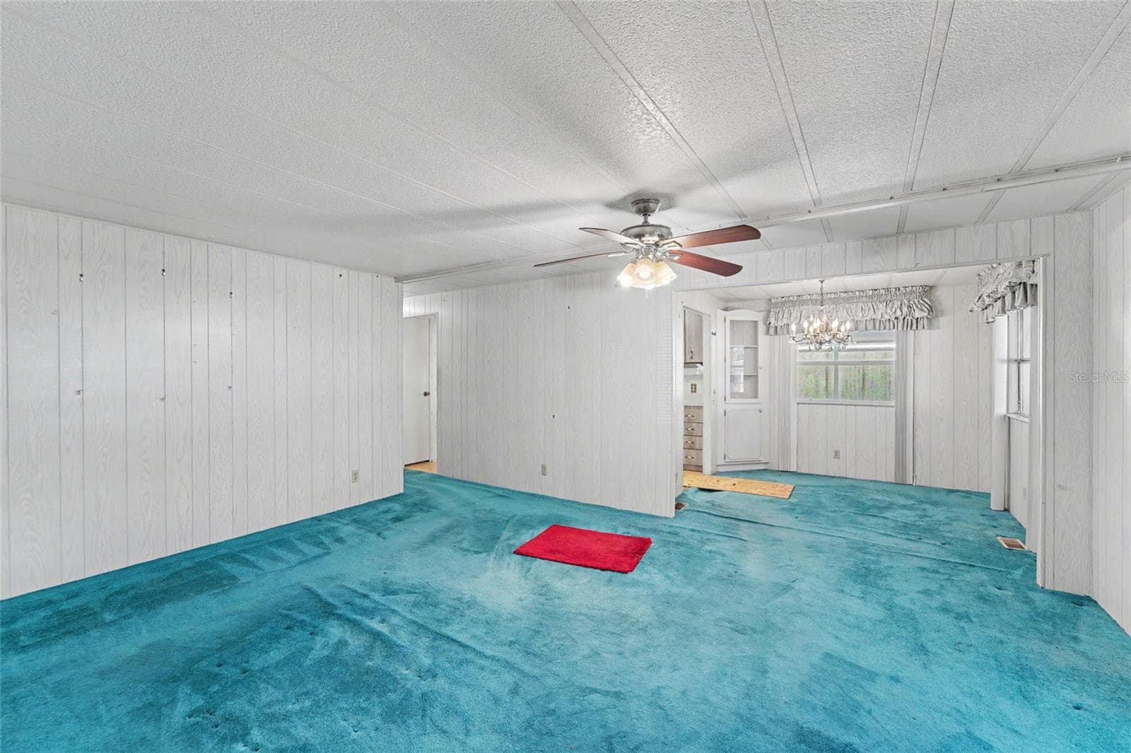 Living room and dining room - 1500 COUNTY ROAD 1 #219, DUNEDIN