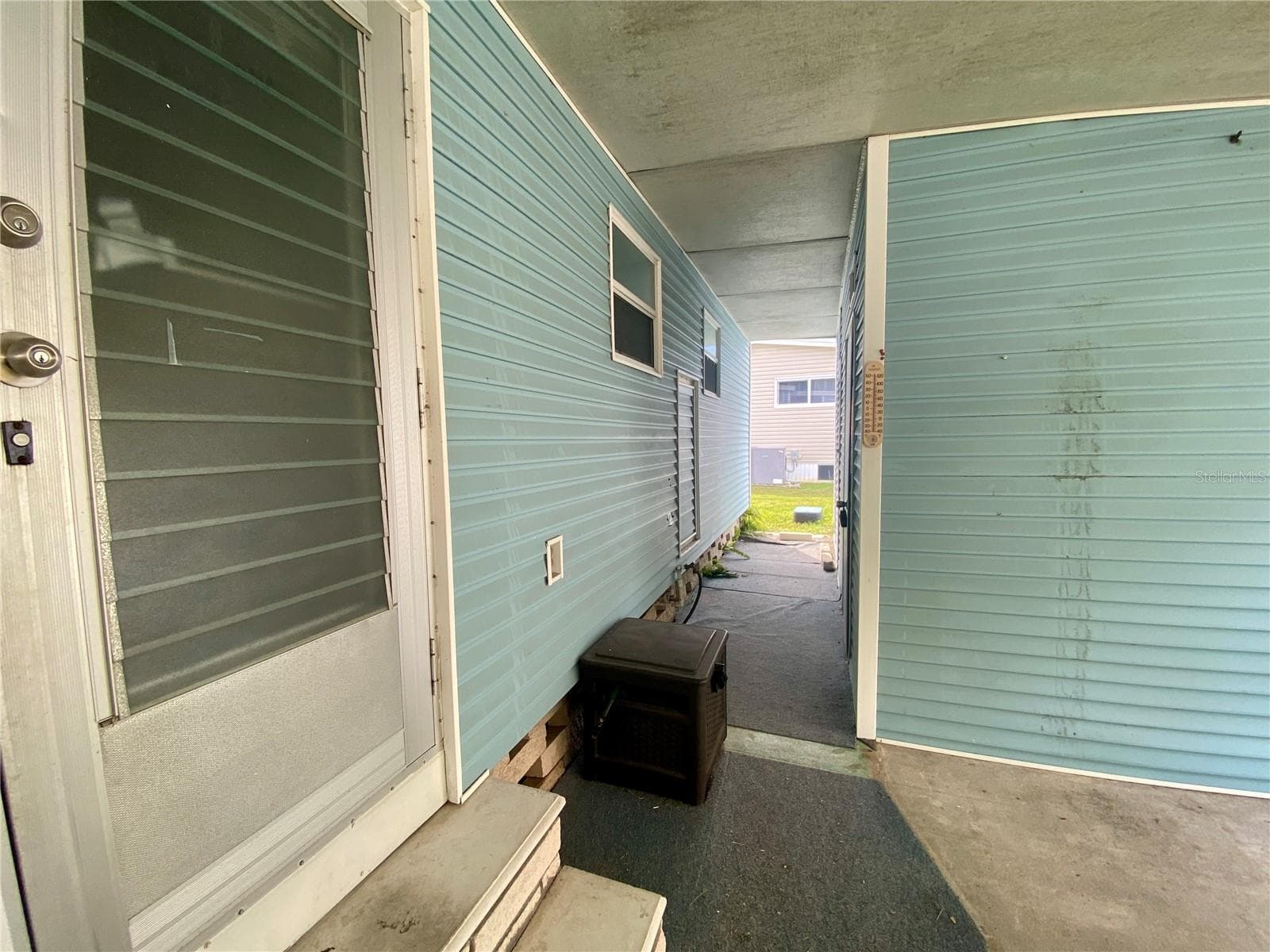 Breezeway to Laundry room and storage - 1500 COUNTY ROAD 1 #219, DUNEDIN
