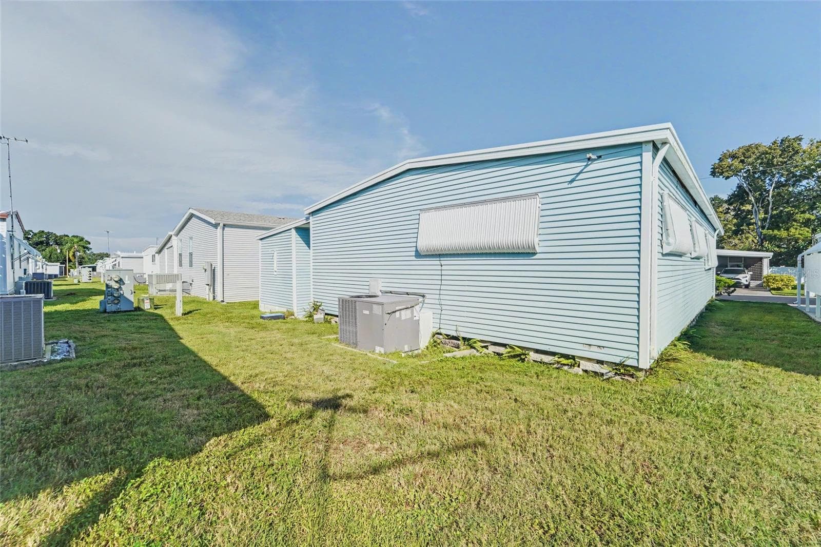 back and side yard - 1500 COUNTY ROAD 1 #219, DUNEDIN
