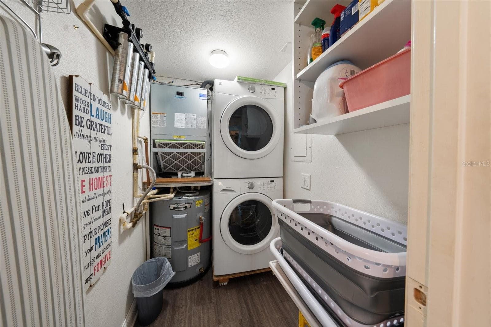 Inside laundry room with storage - 2700 BAYSHORE BLVD #11404, DUNEDIN