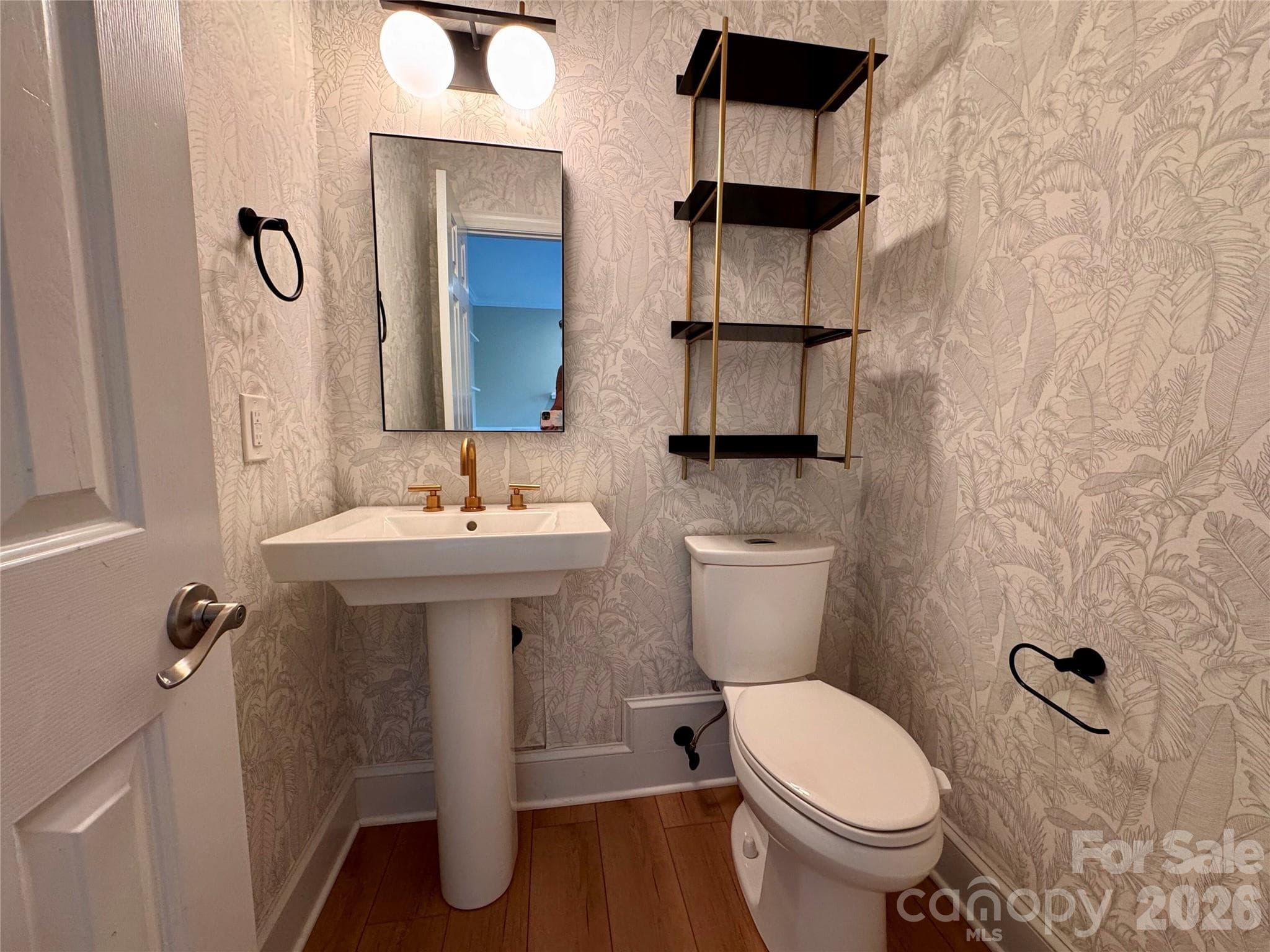 Powder room on the main level - 7101 Founders Way, Harris
