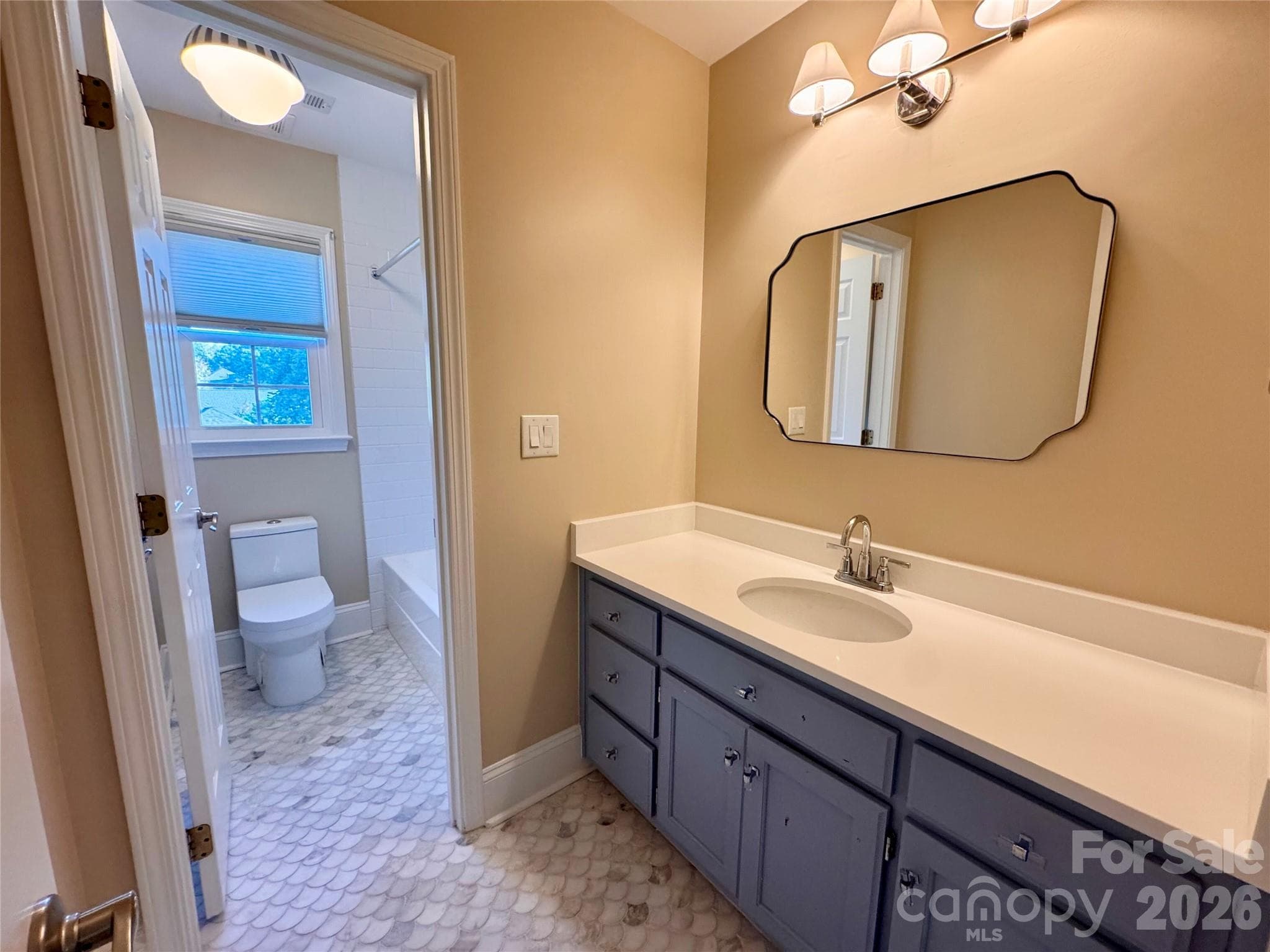 Hall bath-Vanity is separate from the tub/shower and toilet so sharing this bath is a breeze. - 7101 Founders Way, Harris