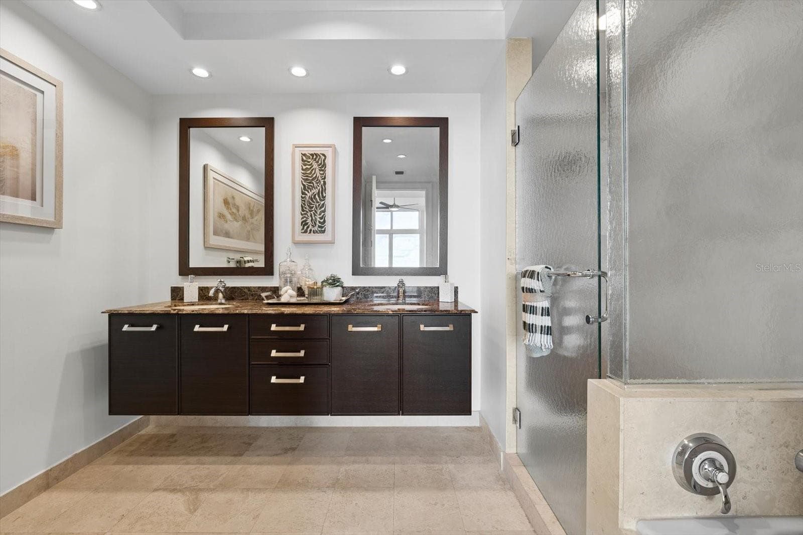 Primary bathroom with stone counters & dal sinks - 1350 MAIN ST #1703, SARASOTA