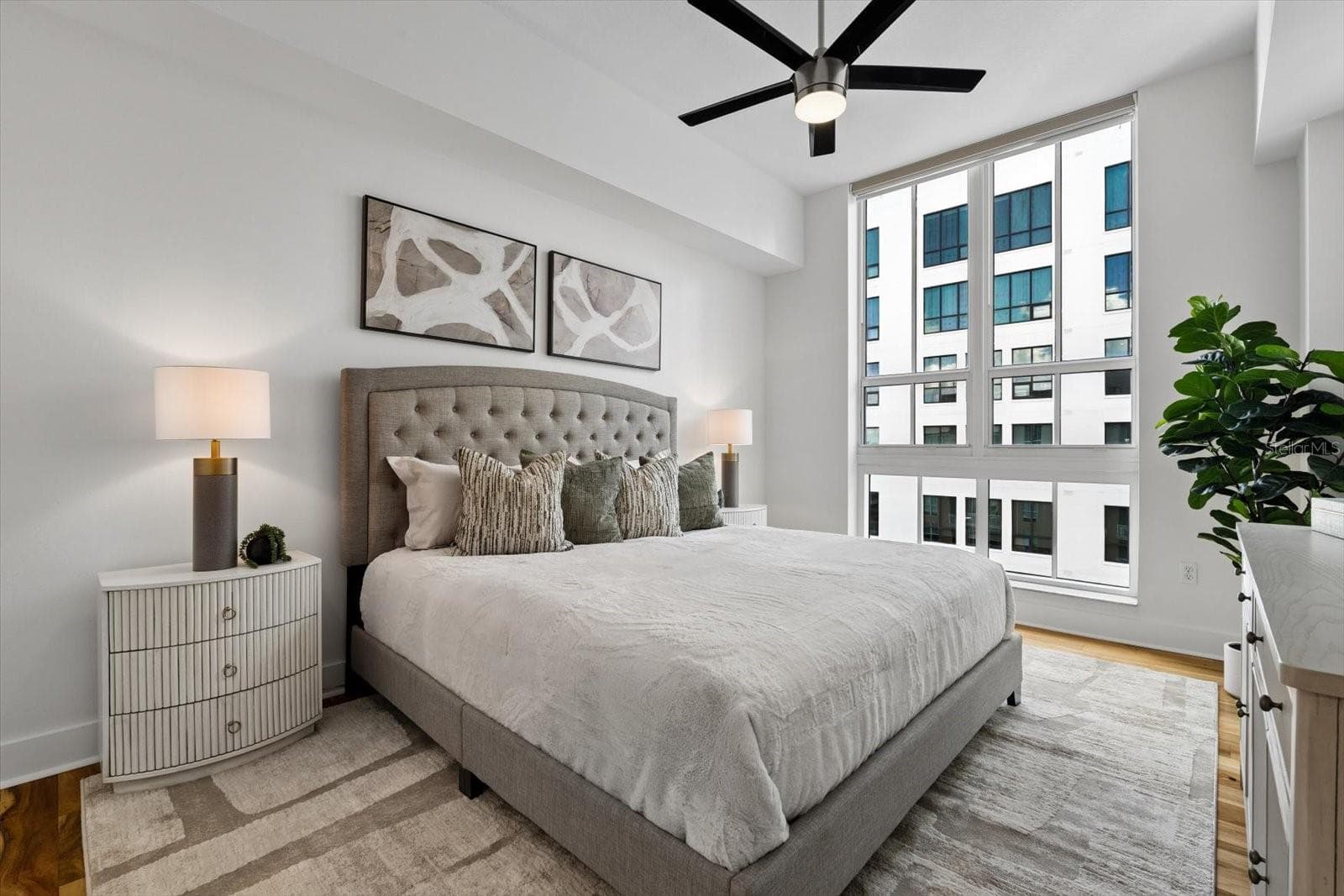 Guest bedroom with walk-in closet and ensuite bathroom - 1350 MAIN ST #1703, SARASOTA