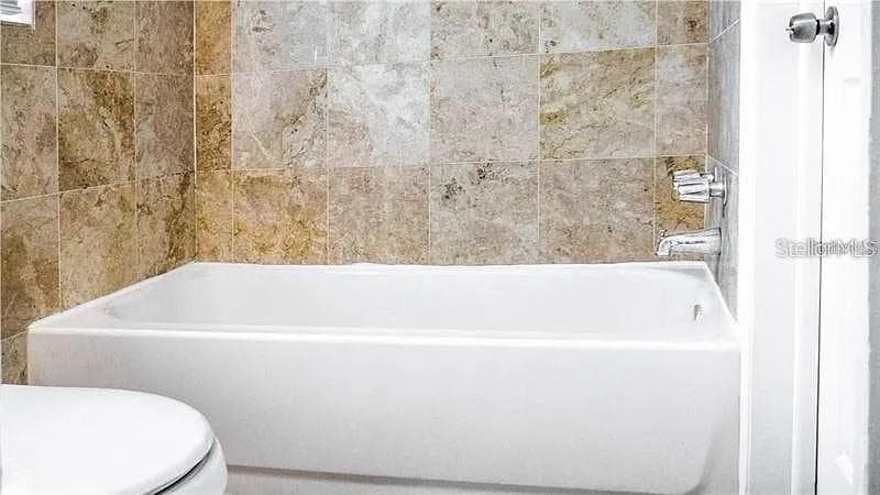 Bathroom with tub - 1274 BERTLAND WAY, CLEARWATER