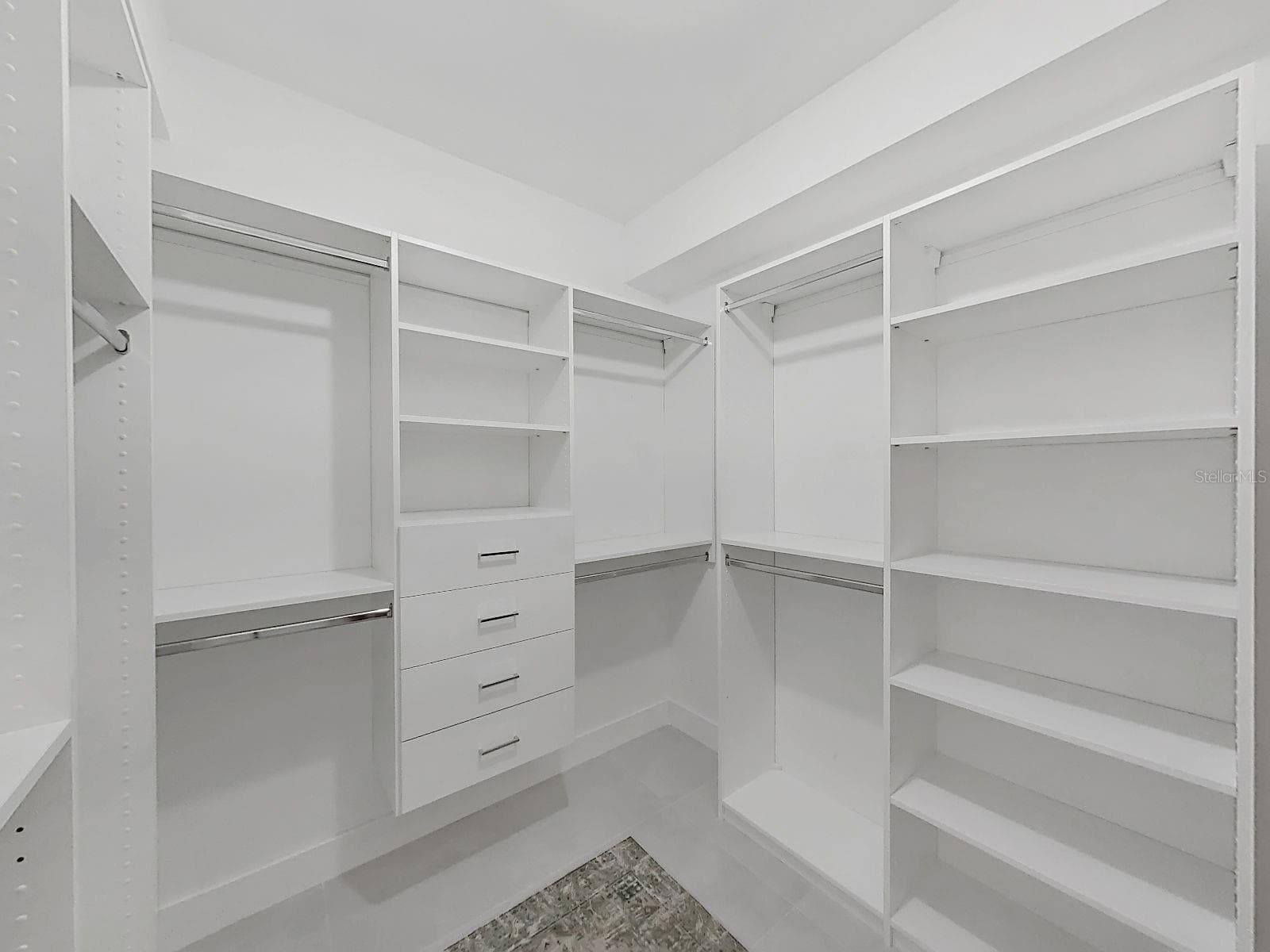 large closet with custom organizing - 15001 MEADOWLAKE ST, ODESSA