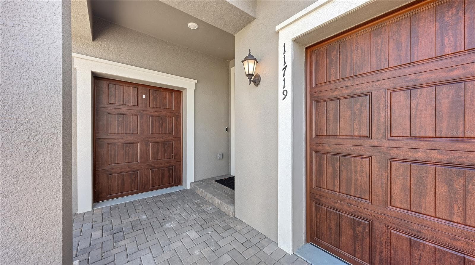 2 car garage and golf cart garage - 11719 LILAC PEARL LN, PARRISH