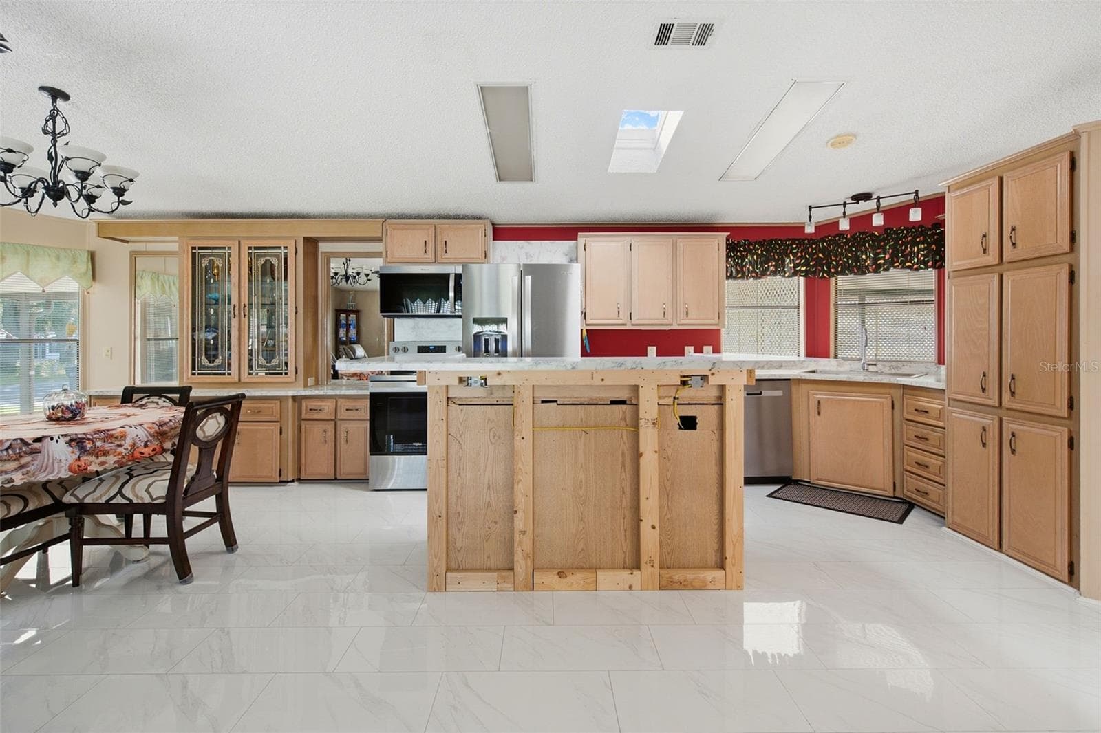 Current condition of kitchen island. Finishing work is scheduled to be completed. - 113 JACKSON PARK AVE, DAVENPORT