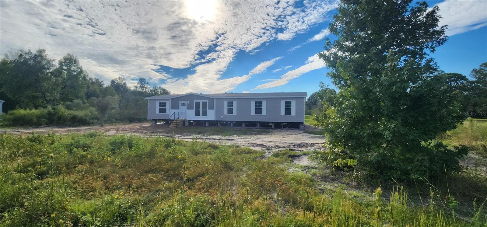 Manufactured Home at 1636 MISTLETOE ST, BUNNELL, photo 4 of 51
