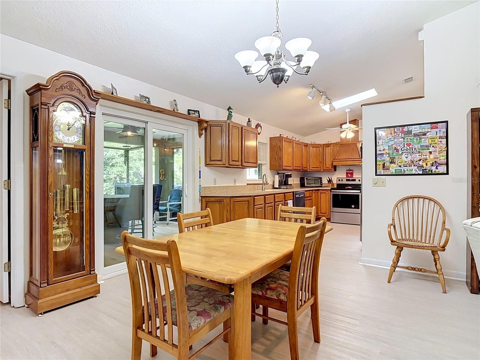 doors lead to BIG screened porch - 469 S FREDERICK AVE, ORANGE CITY