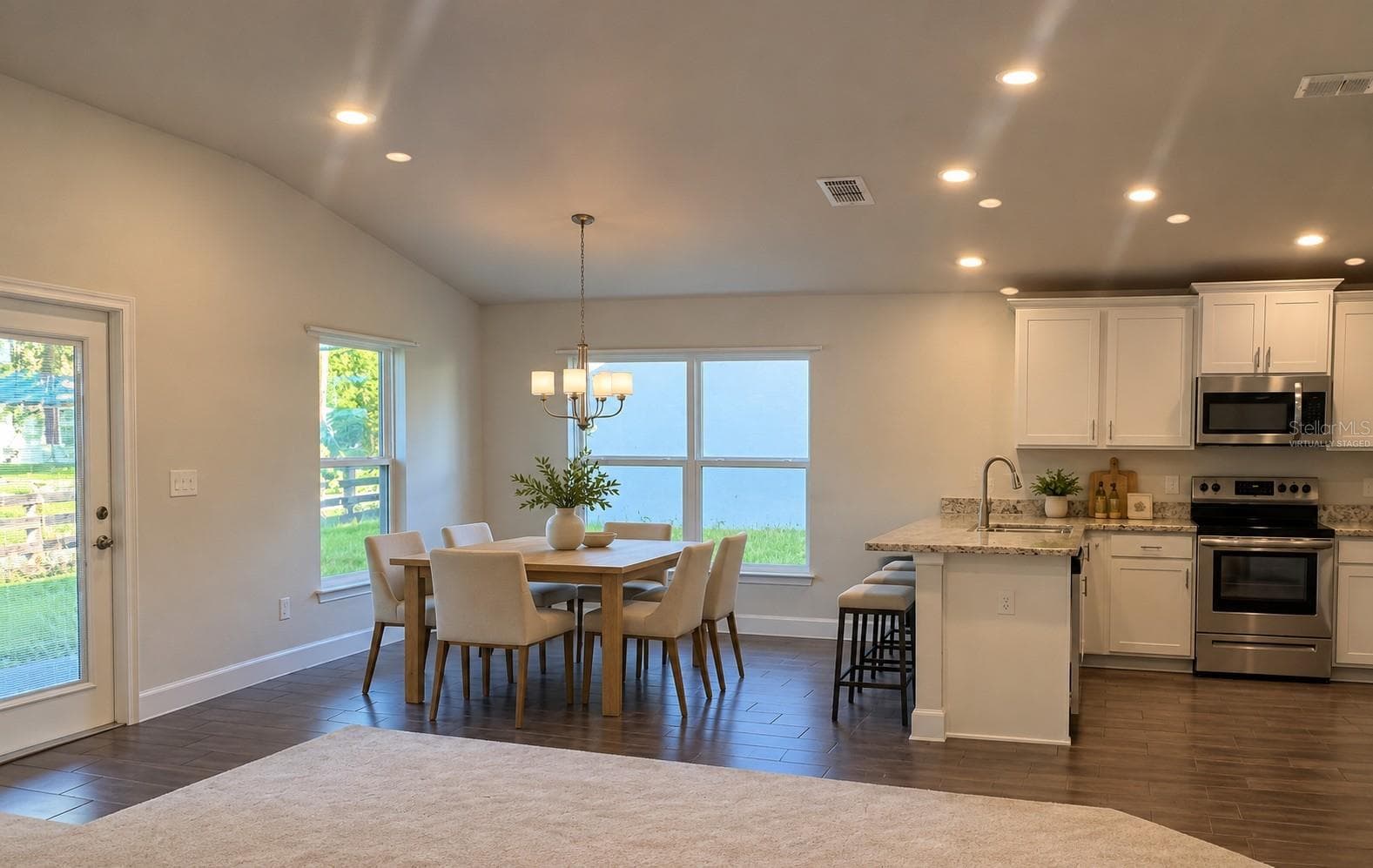 Dining area- virtually staged - 187 NW 45TH LOOP, OCALA