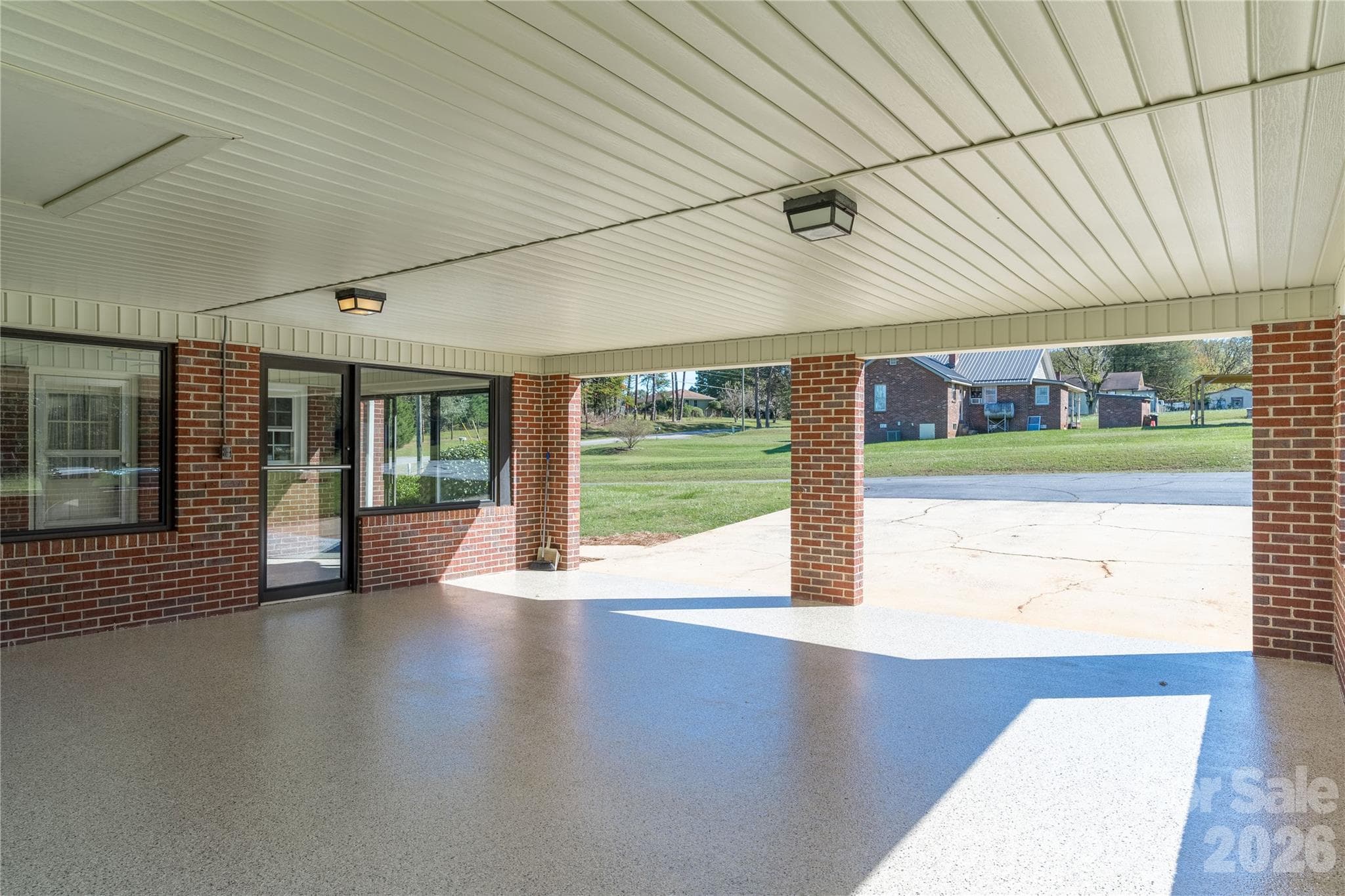 **New update** Carport floor with new coat of epoxy - 5271 Harris Farm Road, Hickory