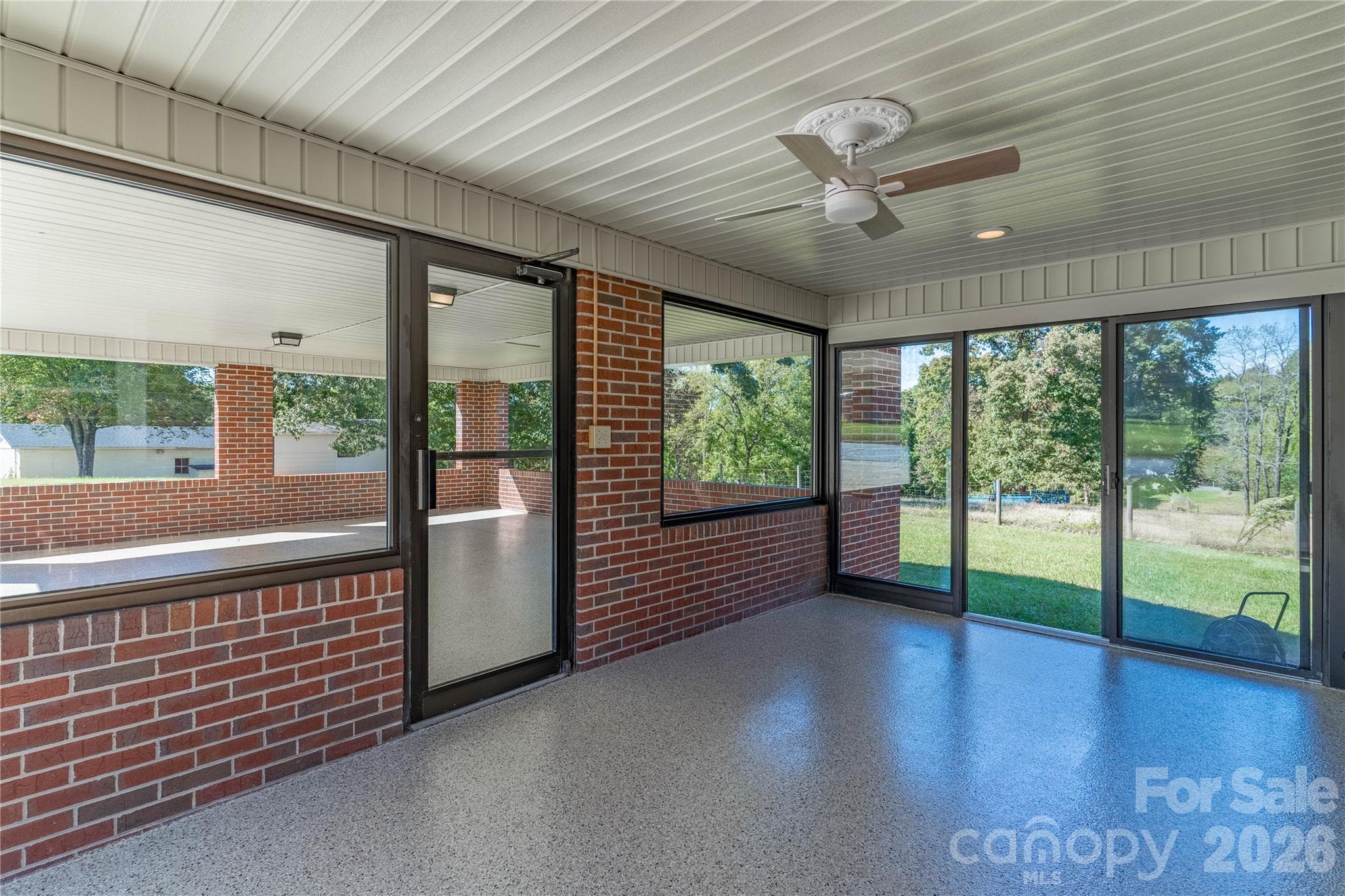 **New update** Sunroom floors with new epoxy coating - 5271 Harris Farm Road, Hickory