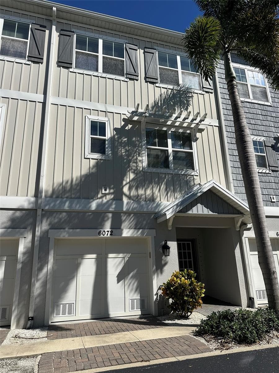 Two car garage, three stories with elevator - 6072 MOORINGS DR S, ST PETERSBURG