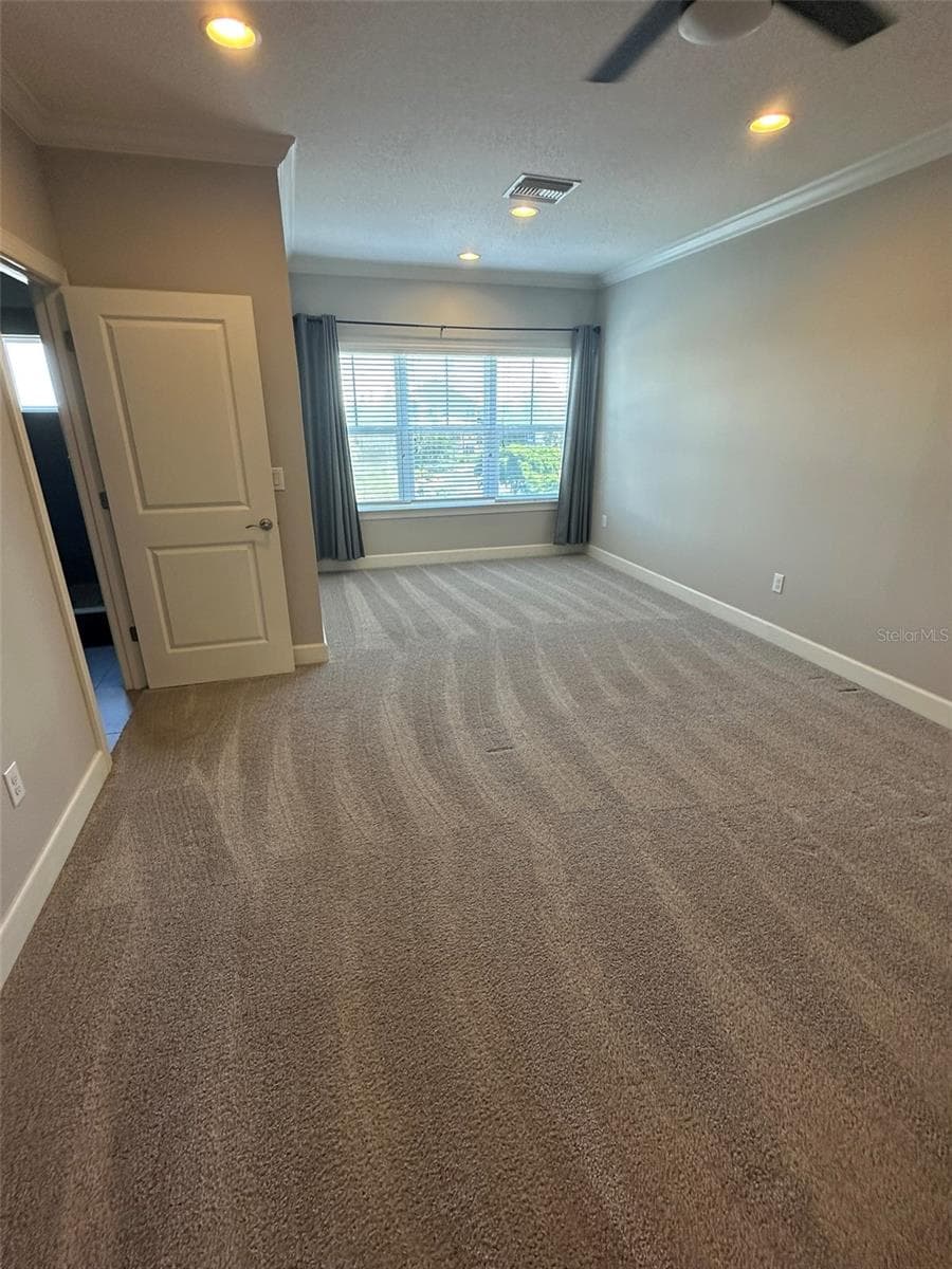 Master Suite, water views, sitting area and private master bathroom - 6072 MOORINGS DR S, ST PETERSBURG