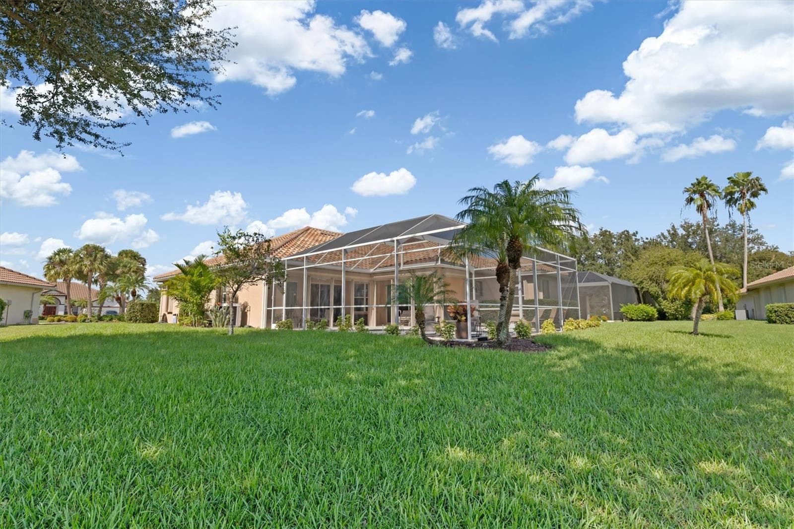 Rear view of property - 4120 LAKES CT, PORT CHARLOTTE