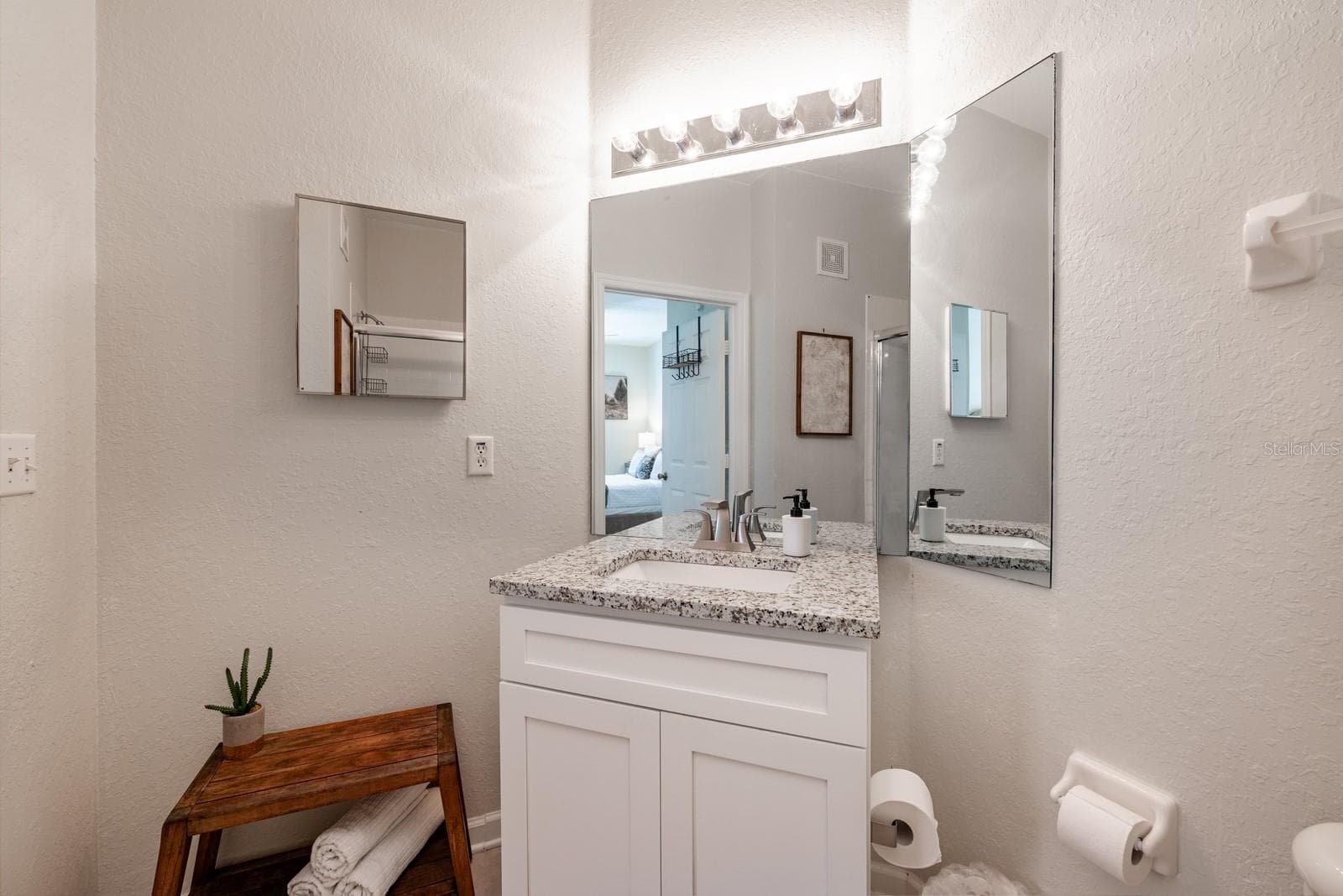 spa shower bench and updated vanity. - 2778 ALMATON LOOP #204, KISSIMMEE