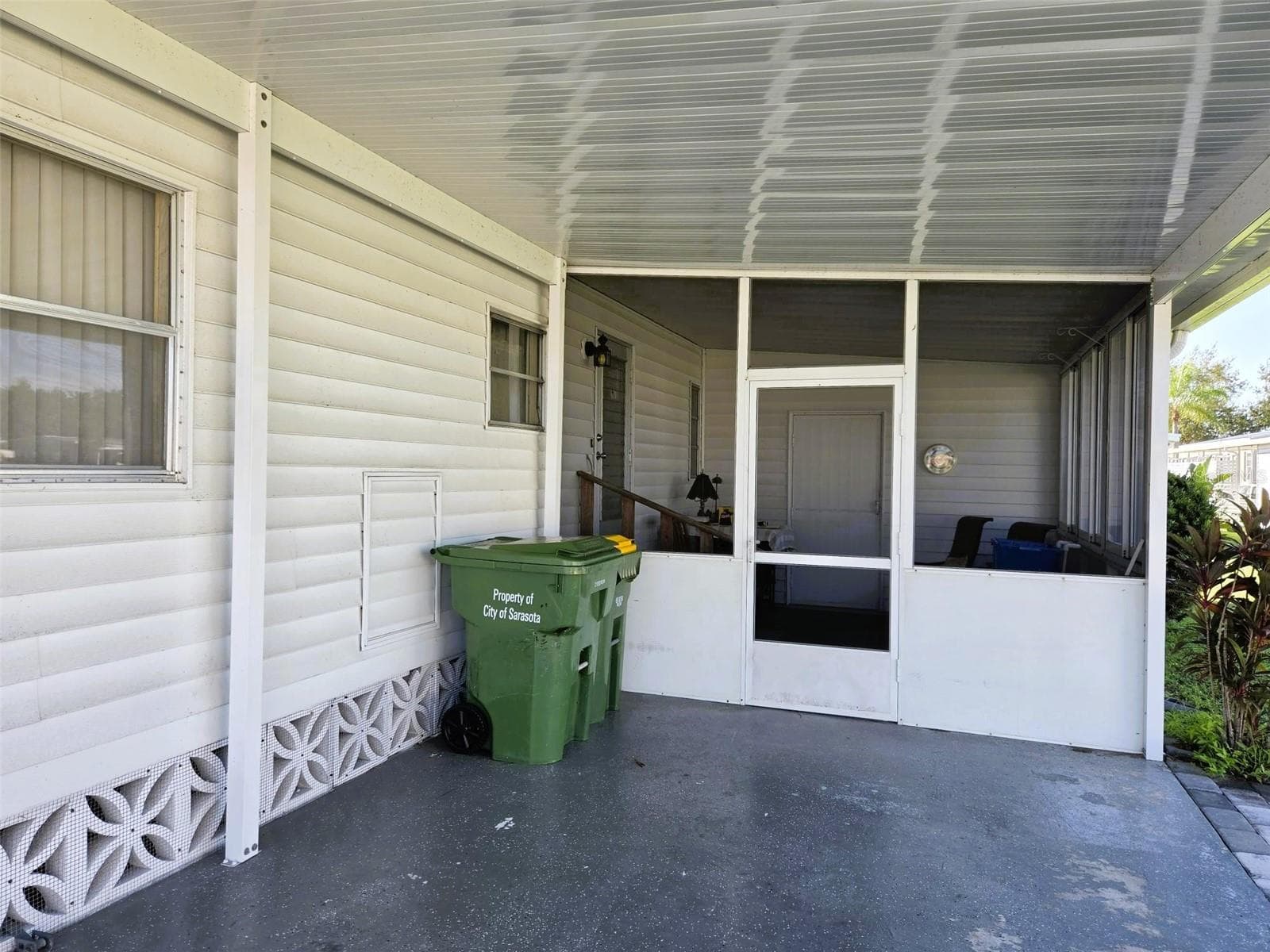 Carport area with new roof - 3308 OVER CUP OAK TER, SARASOTA