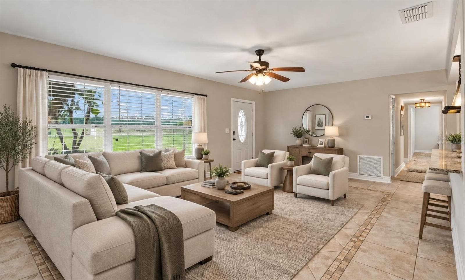 Living area main home virtually staged - 5106 THONOTOSASSA RD, PLANT CITY