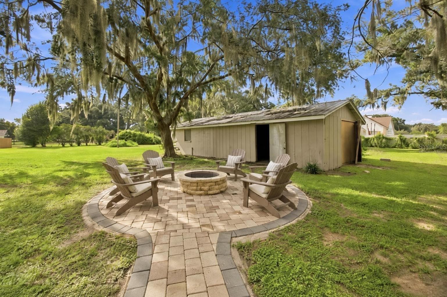 Virtually staged fire pit area - 5106 THONOTOSASSA RD, PLANT CITY