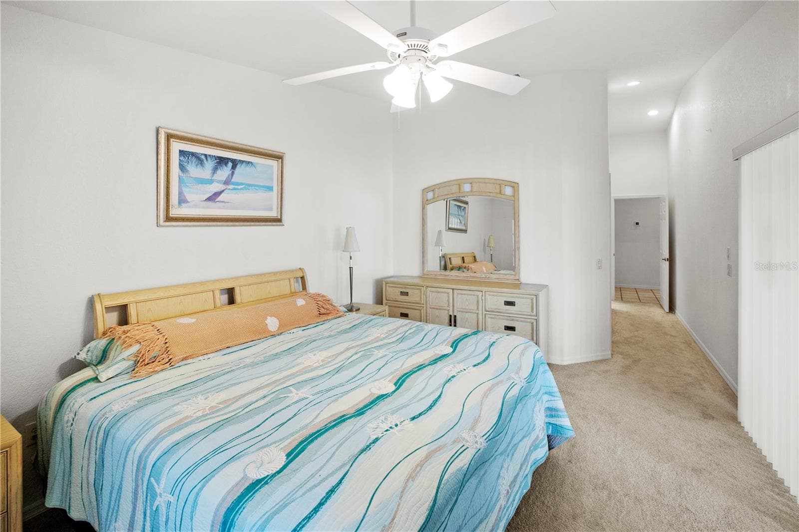 Spacious 12' x 16' Primary Bedroom with Gorgeous Lake Views and Sliders out to the Relaxing Lanai - 26283 NADIR RD #201, PUNTA GORDA