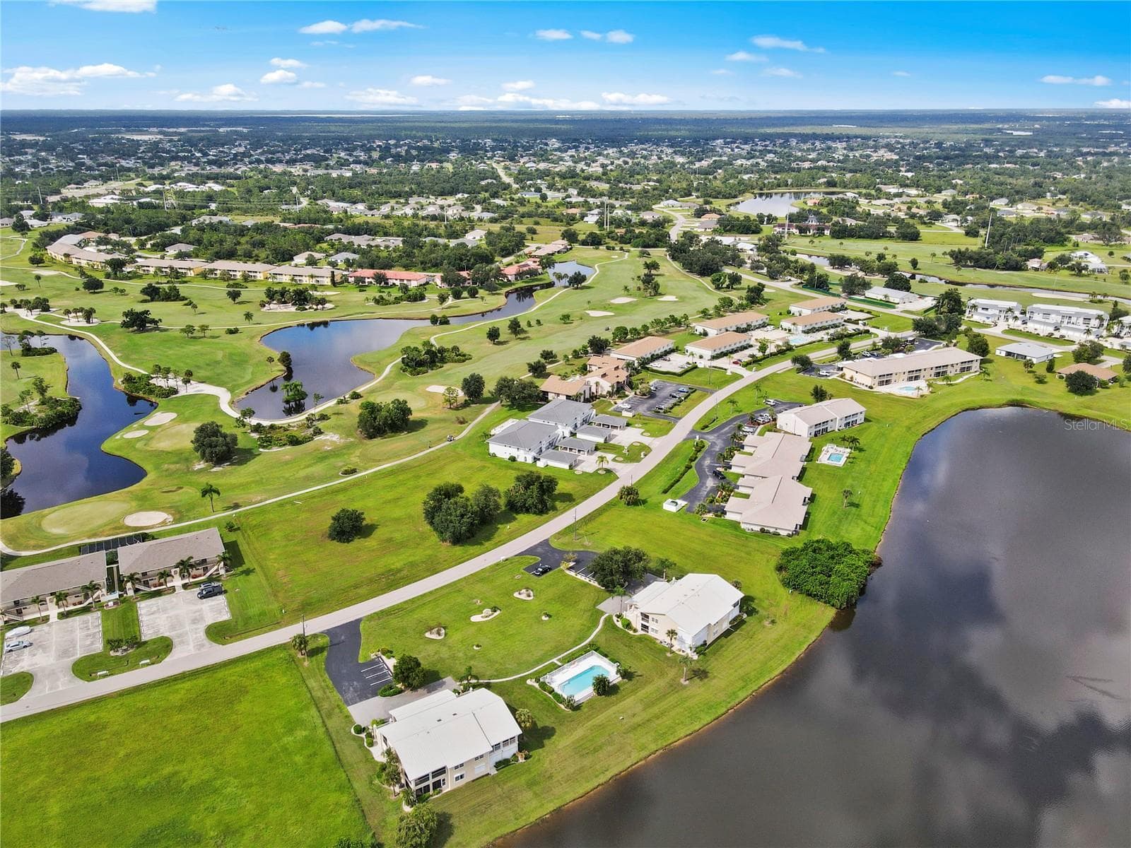 Welcome to Vista Del Largo in Deep Creek on Lake Rio - 26283 NADIR RD #201, PUNTA GORDA