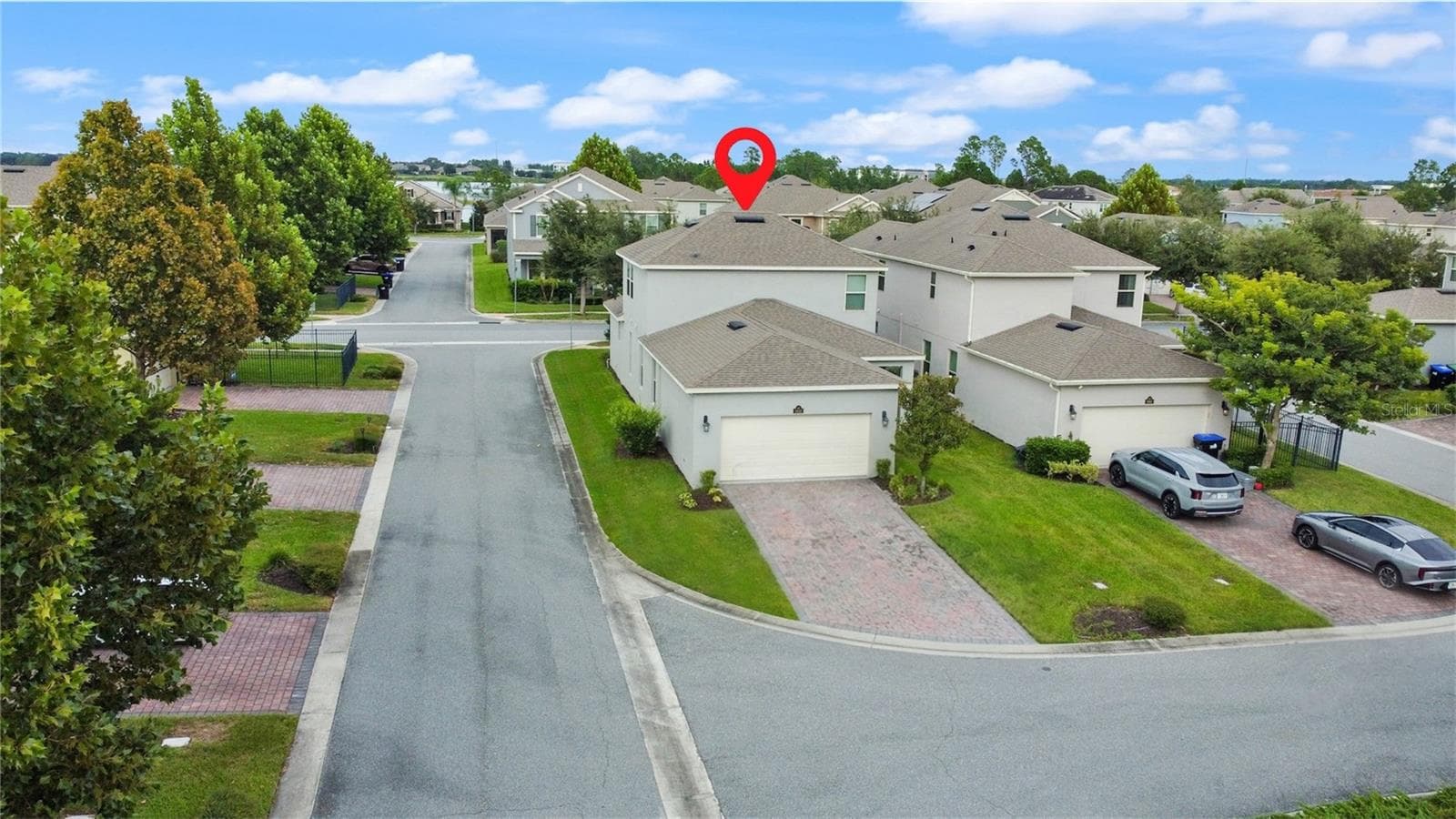 Garage & driveway located in the rear of the home. - 9662 WATERWAY PASSAGE DR, WINTER GARDEN