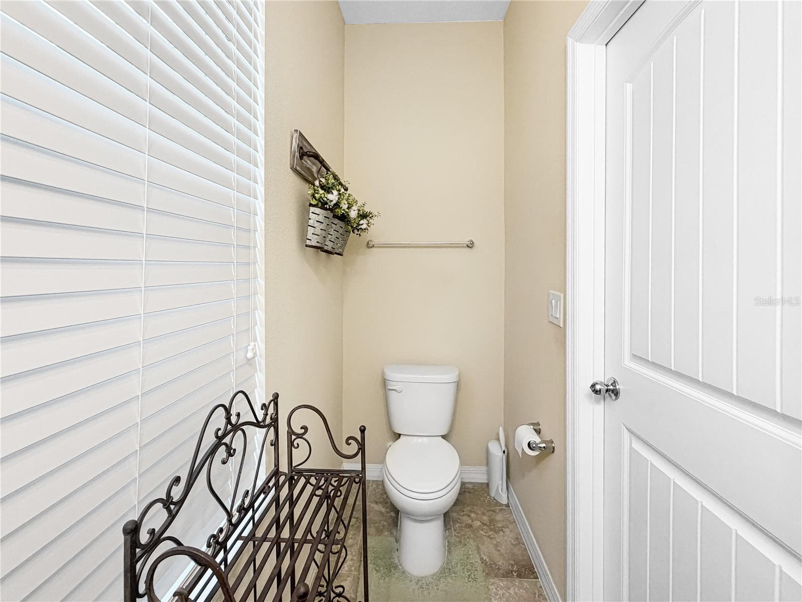 Powder room located downstairs - 9662 WATERWAY PASSAGE DR, WINTER GARDEN
