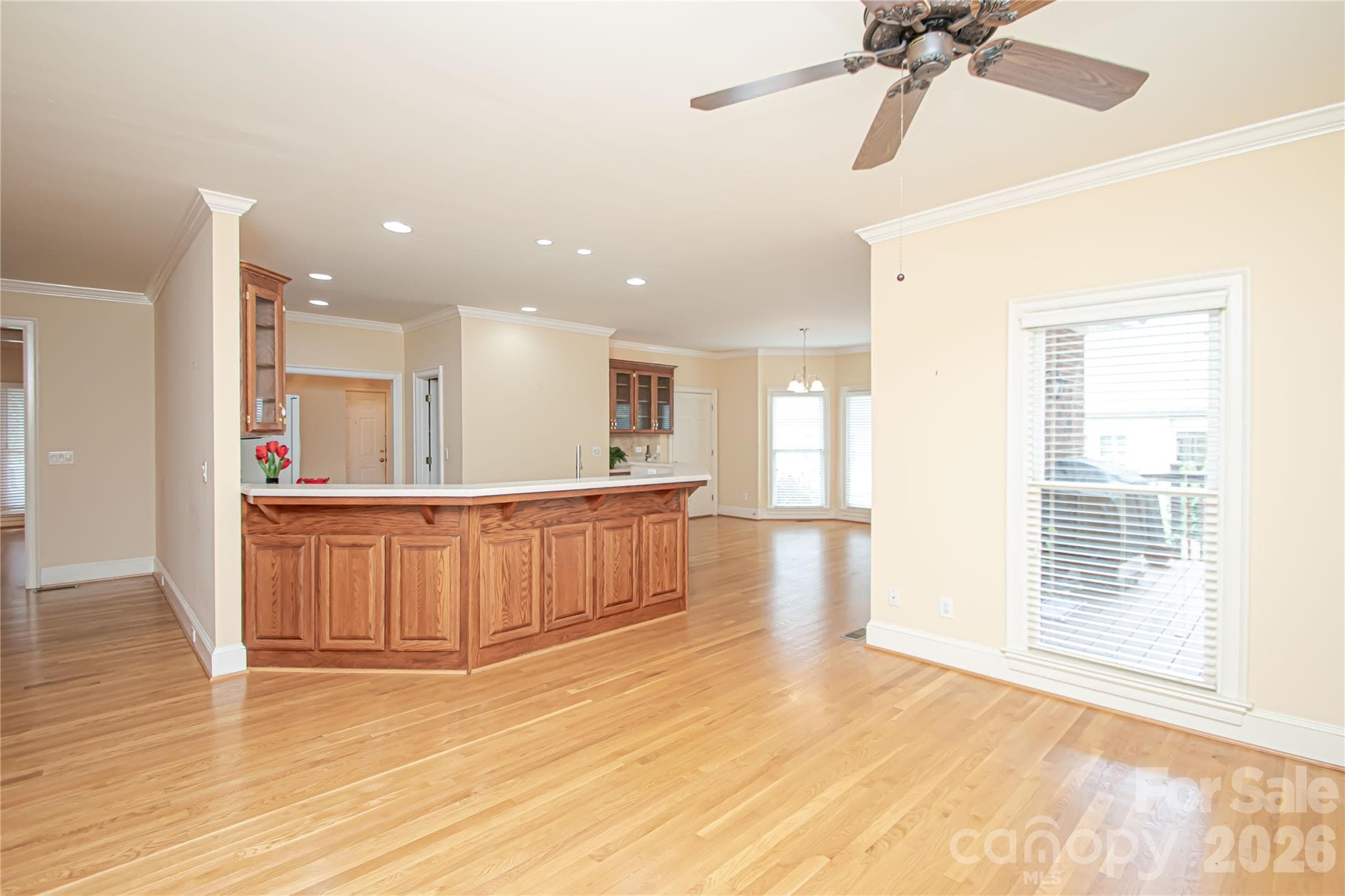 SITTING/OFFICE or FLEX by Kitchen 14'x20': ceiling fan is also pre wired for a ceiling light. Customable area for your family needs. - 5480 Glen Forest Drive, Charlotte