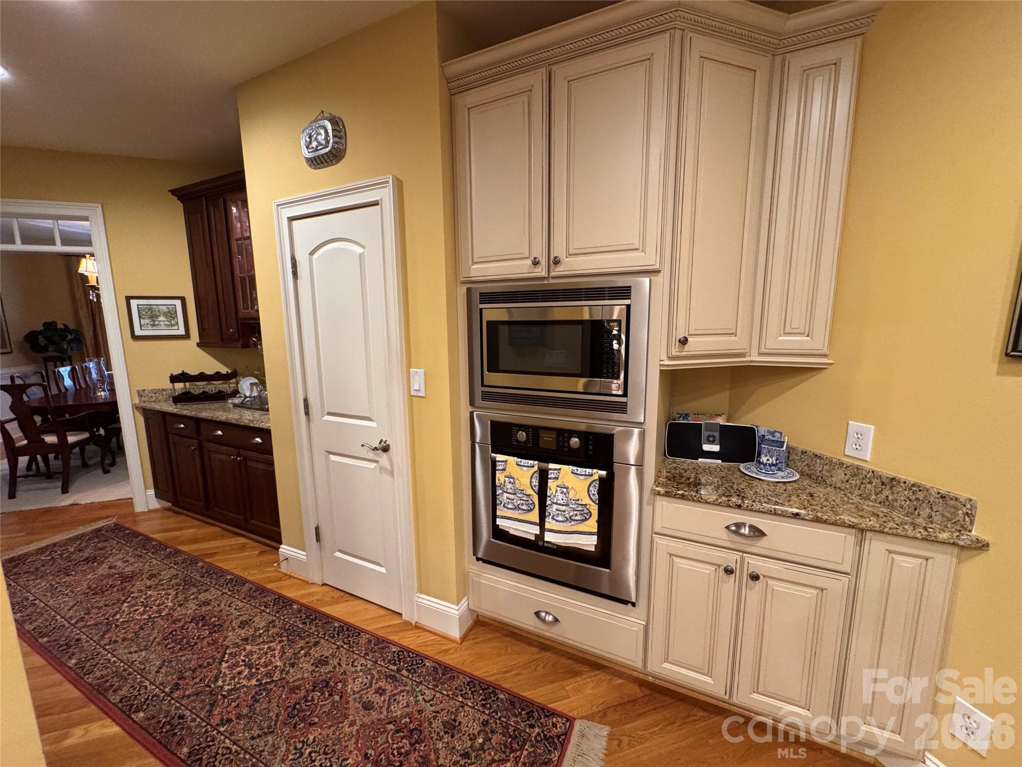 Butlers pantry/bar, Pantry, built in microwave/wall oven and additional countertop space for serving - 2909 Donegal Drive, Kannapolis