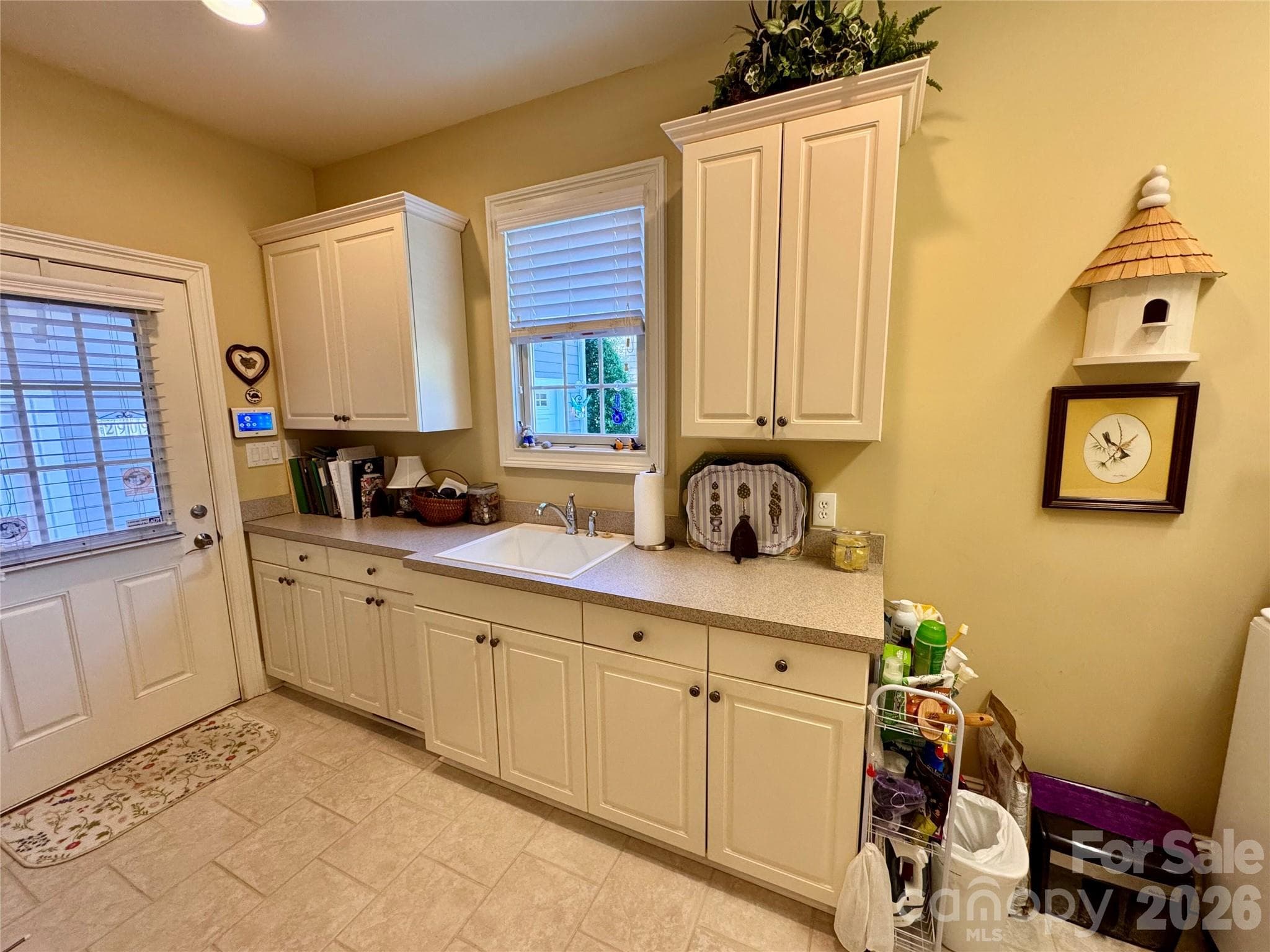 Laundry room-access to the covered breezeway from the garage - 2909 Donegal Drive, Kannapolis